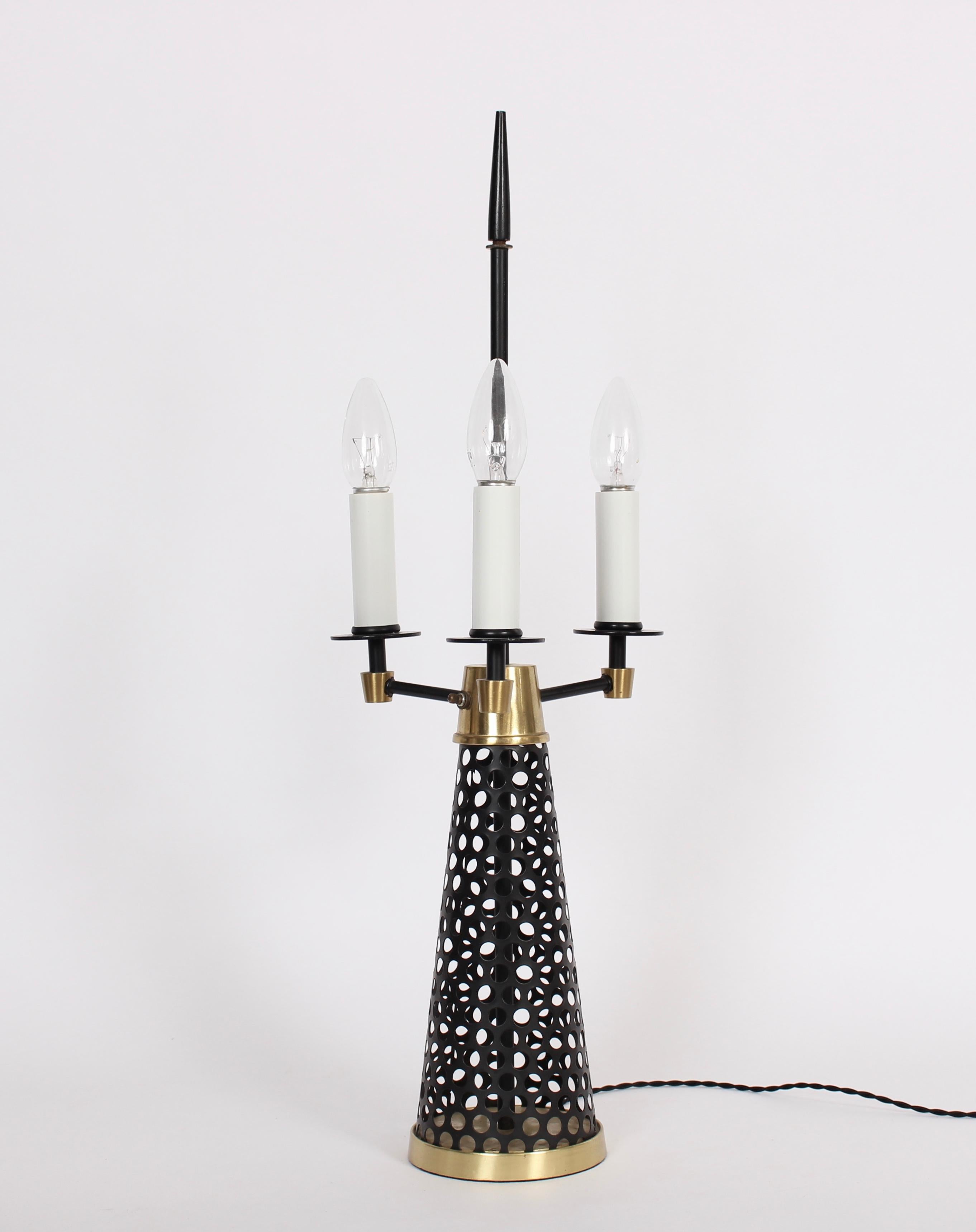 Tony Paul Style Pierced Black Cone, Brass & White Triple Candlestick Table Lamp In Good Condition For Sale In Bainbridge, NY