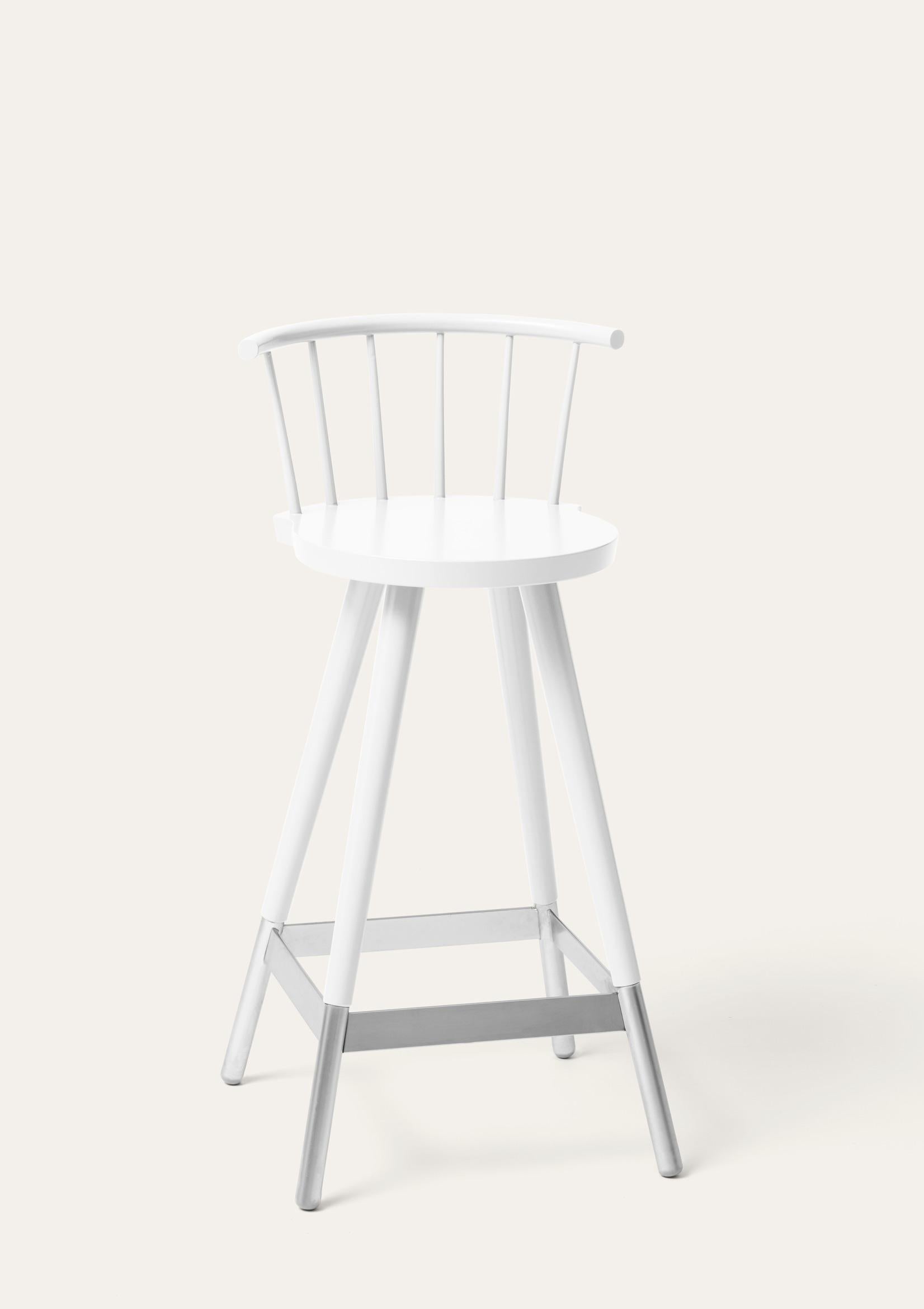 White Tupp barstool by Storängen Design
Dimensions: D 41 x W 41 x H 85 x SH 65 cm
Materials: birch wood, nickel plated steel.
Also available in other colors.

Give the bar some character! Tupp is avaliable in two heights, both with and without