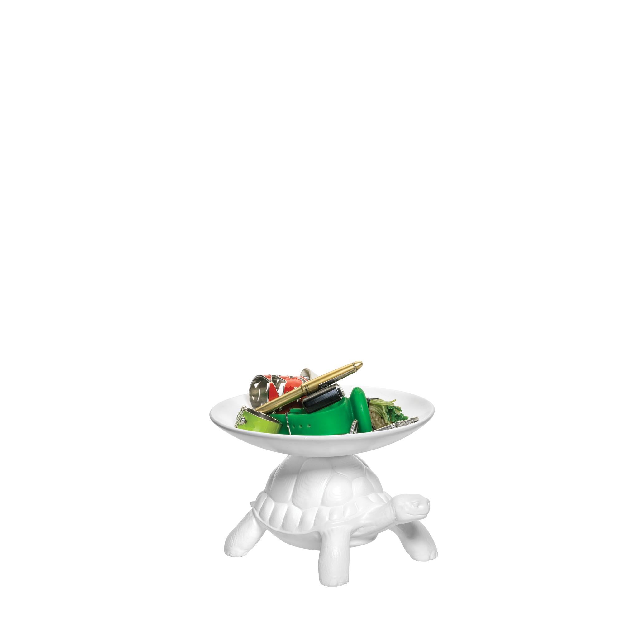After the success of Turtle Carry, Marcantonio presents the iconic turtles in a small version.
The turtle carapace supports a pocket emptier.

Produced in white opaque resin, they catch the attention and they fit perfectly into any corner of the