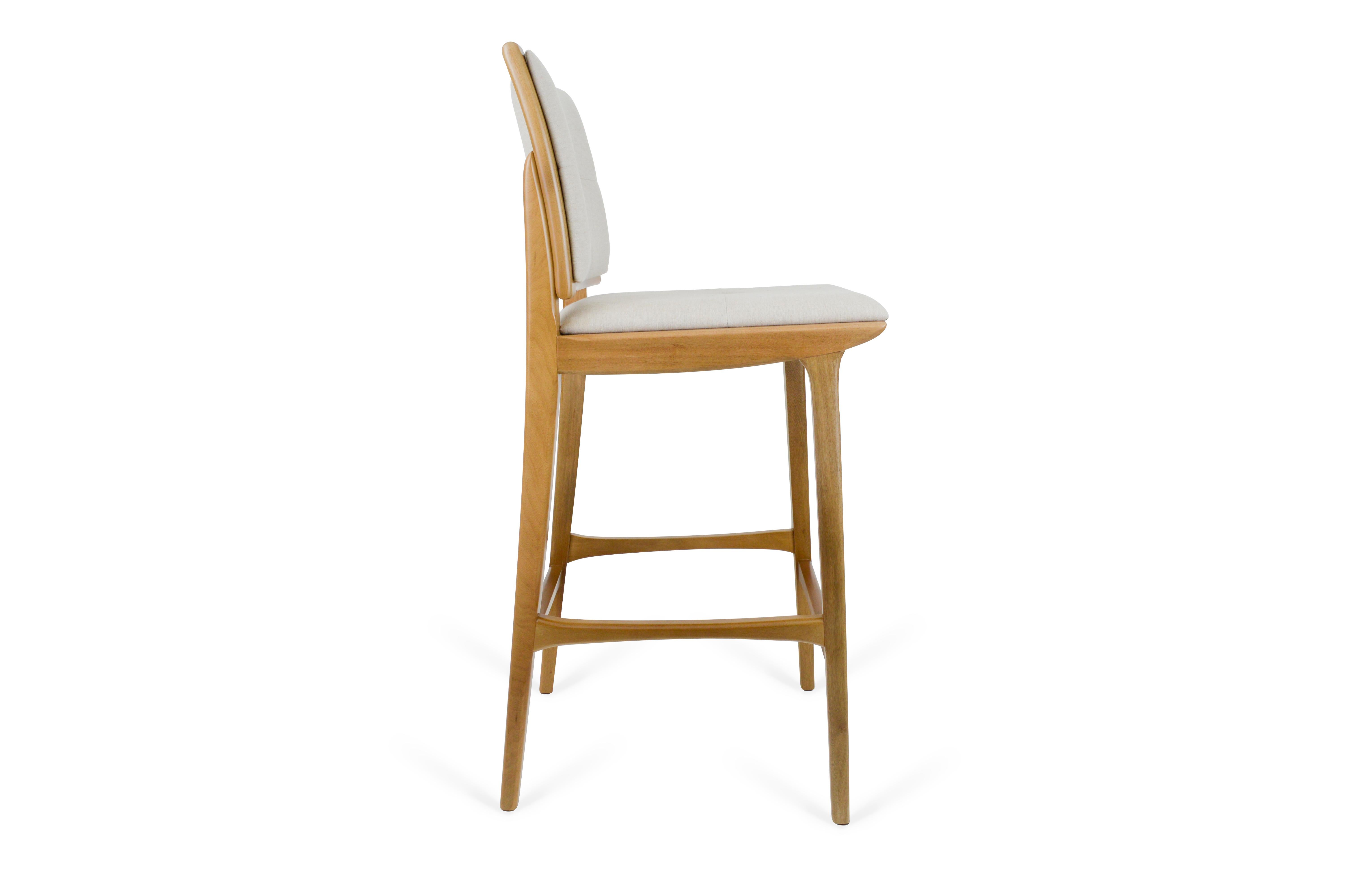 With a solid wood structure, the Zig stool backrest has a slight inclination to support the back and the seat extends to the front of the piece to accommodate the legs more comfortably.

Studiokaza products are available in different finishes.