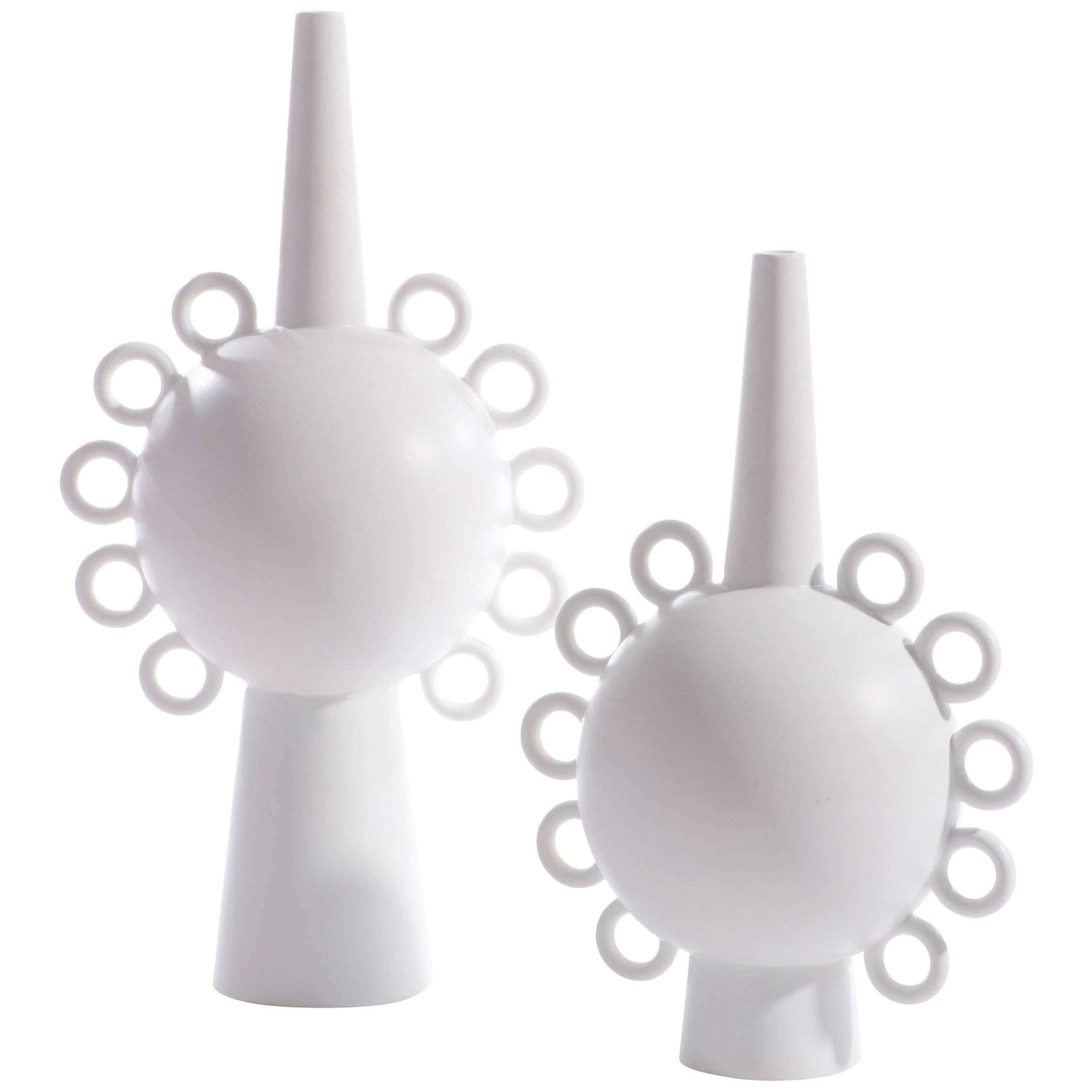 Contemporary French large matte white vase with ten rings and spout opening.
Larger size also available S6721.
From a collection of other matte white vases in varying sizes and shapes.