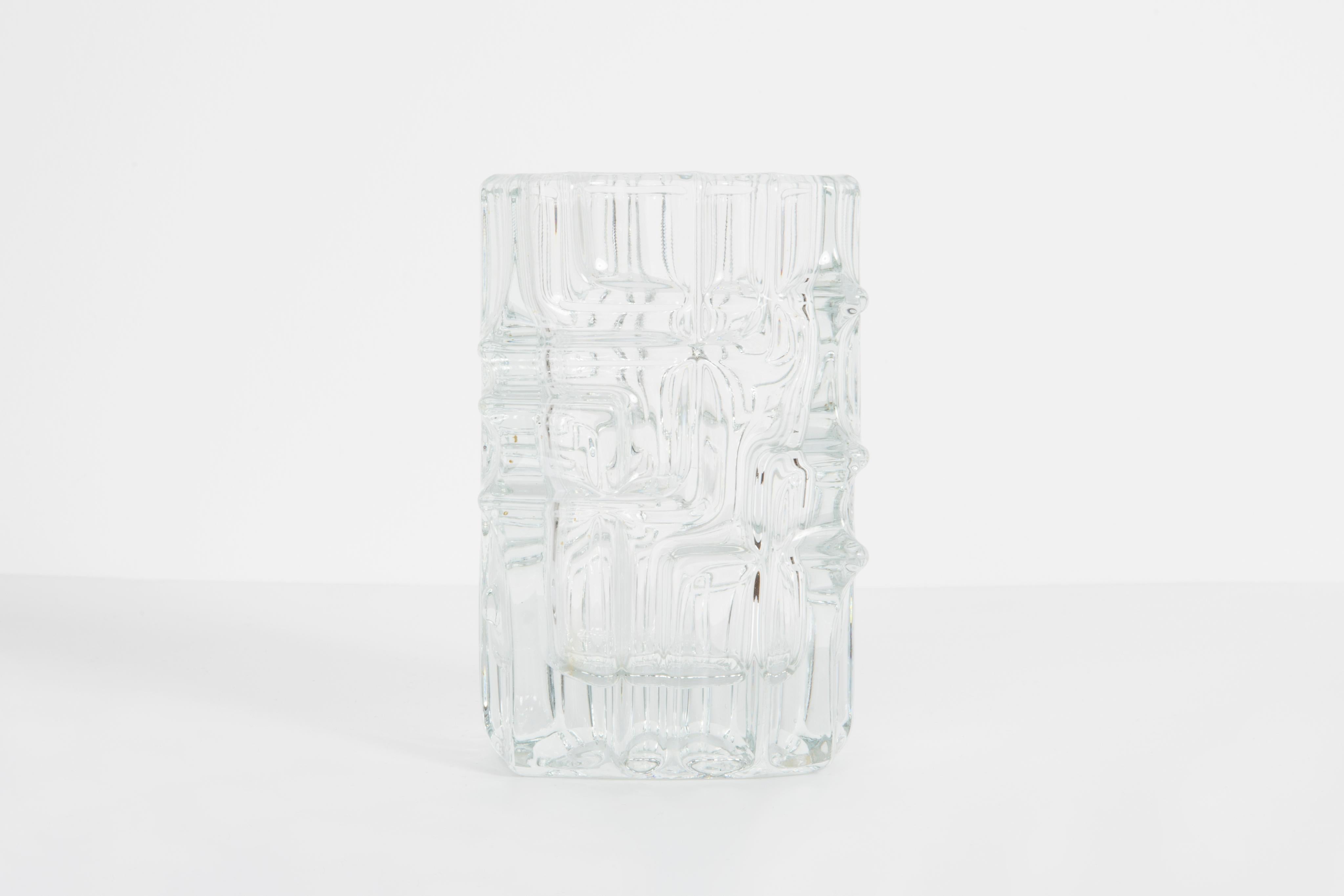 Transparent vase by Vladislav Urban - Czechoslovakian glass designer. Produced in 1960s.
Pressed glass in perfect condition. The vase looks like it has just been taken out of the box.
No jags, defects etc. The outer relief surface, the inner