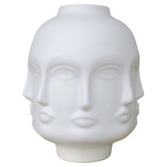 White Vase Faces Sculpture