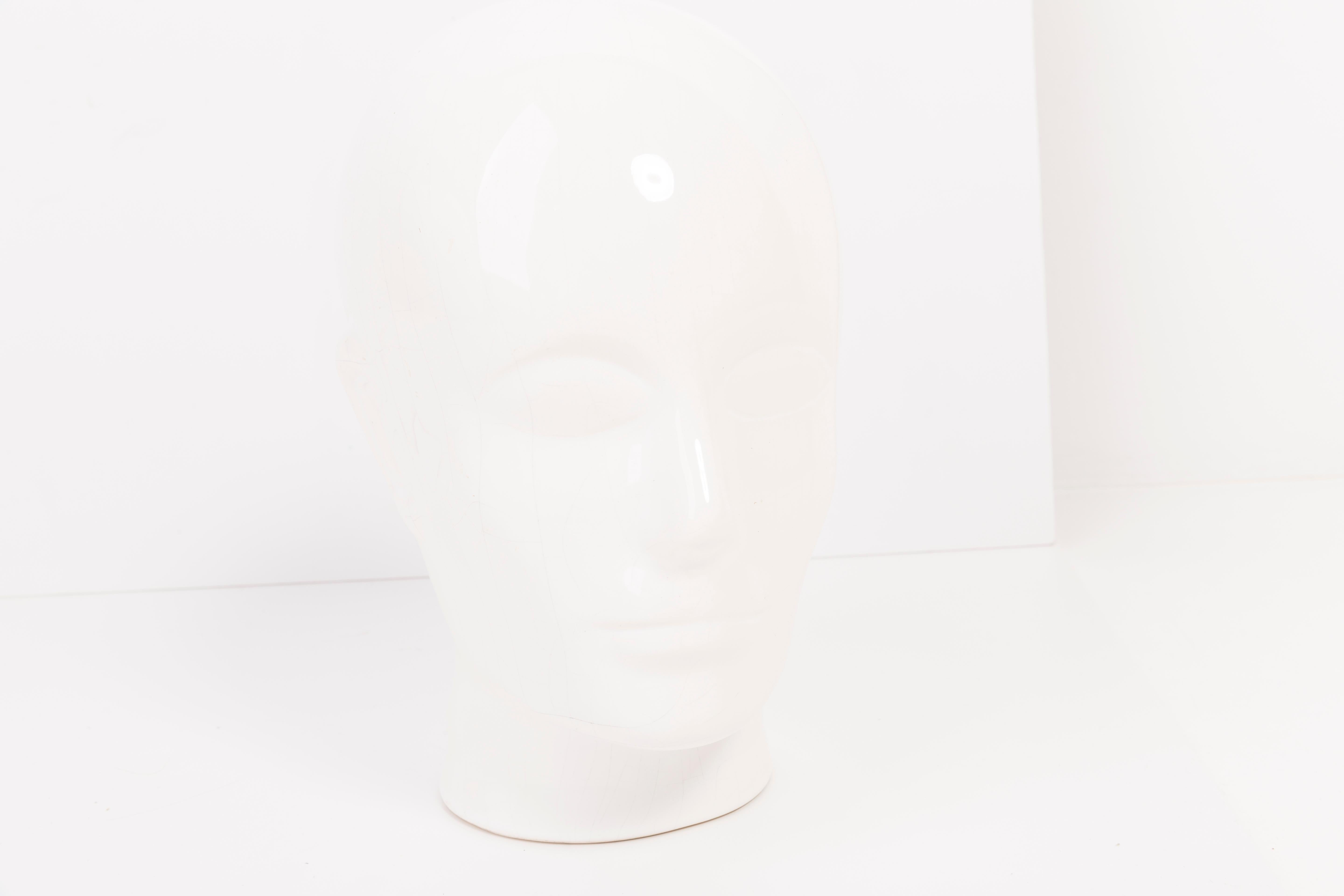 Life-size porcelain head in a white color. Produced in a German steelworks in the 1970s. Original good vintage condition. A perfect addition to the interior, photo prop, display or headphone stand.