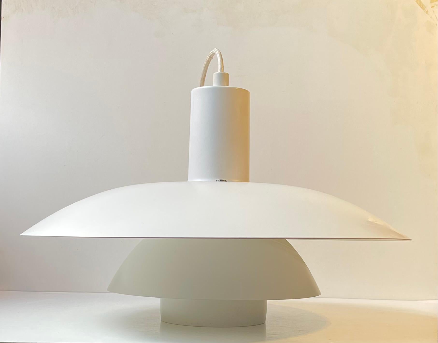 A very rare version in the Poul Henningsen metal series. It's basically a PH 4/3 on steroids. It is taller and wider. It was made for a brief time during the 1980s based upon a design from the 1920s. It came in a copper version and in this one -