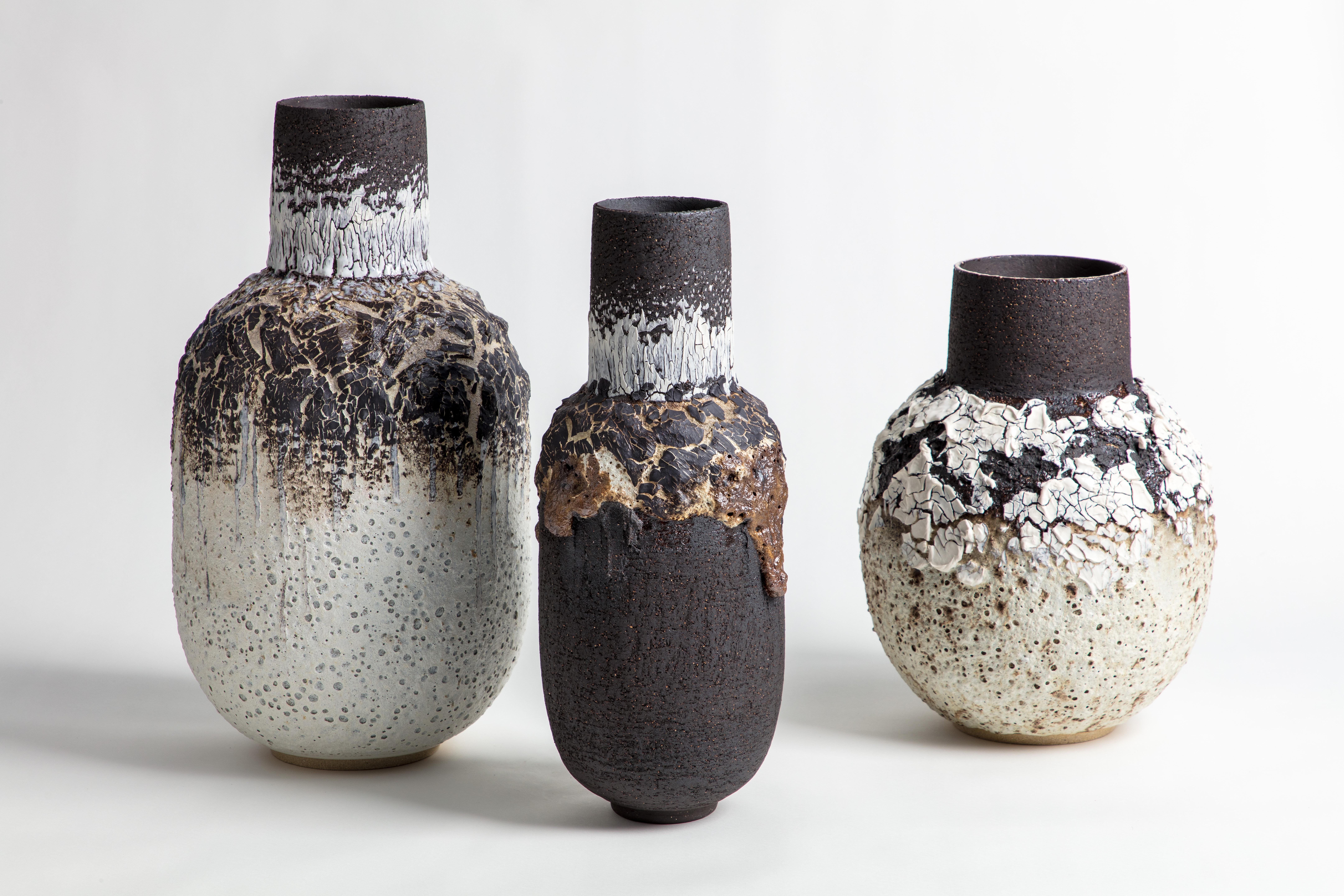 Organic Modern White volcanic decorative vessel with black porcelain crackle For Sale