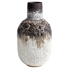 White volcanic decorative vessel with black porcelain crackle