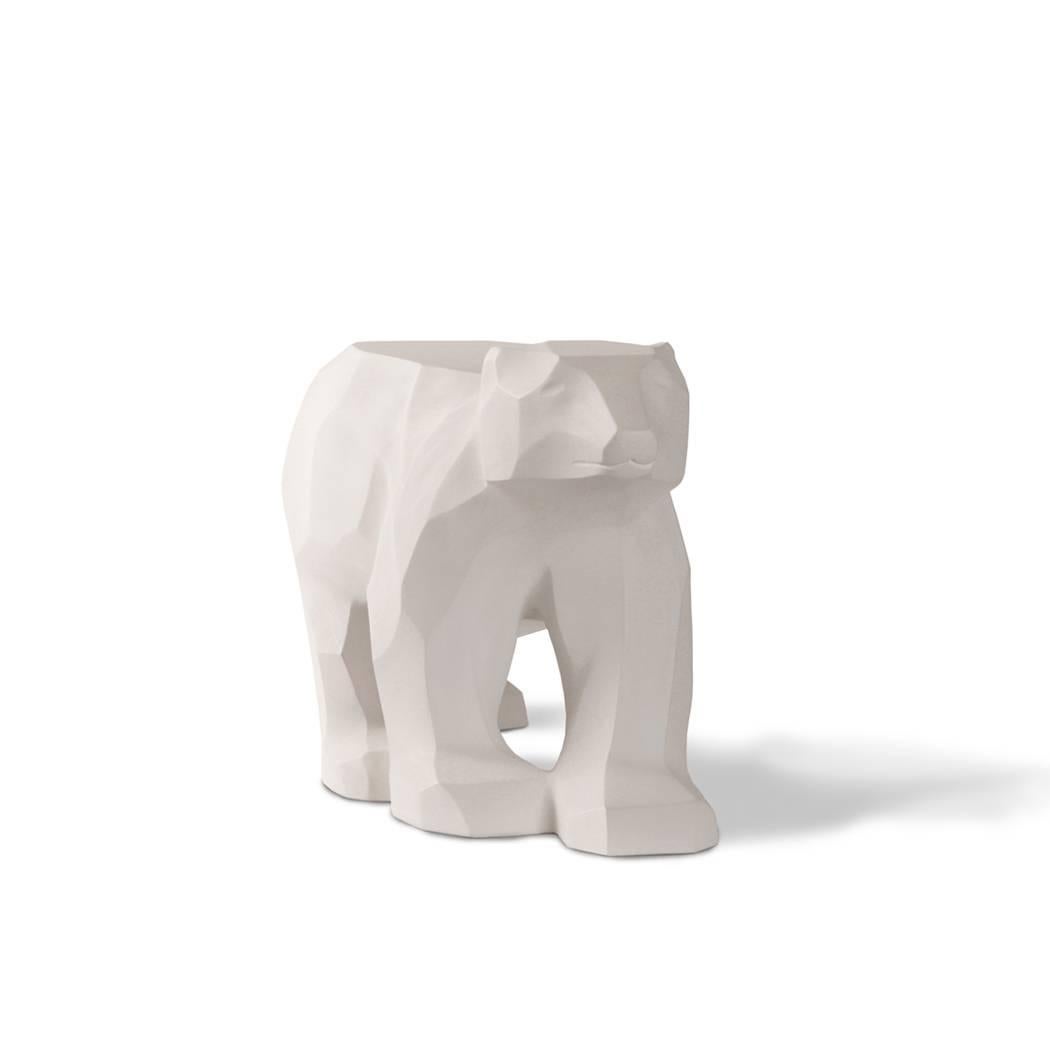 This piece was inspired by the polar bear, a Classic Canadian icon. Its form is reminiscent of the purity and beauty of arctic glaciers and striking winter landscapes. Pieces are designed for interiors, but will tolerate careful exterior usage.