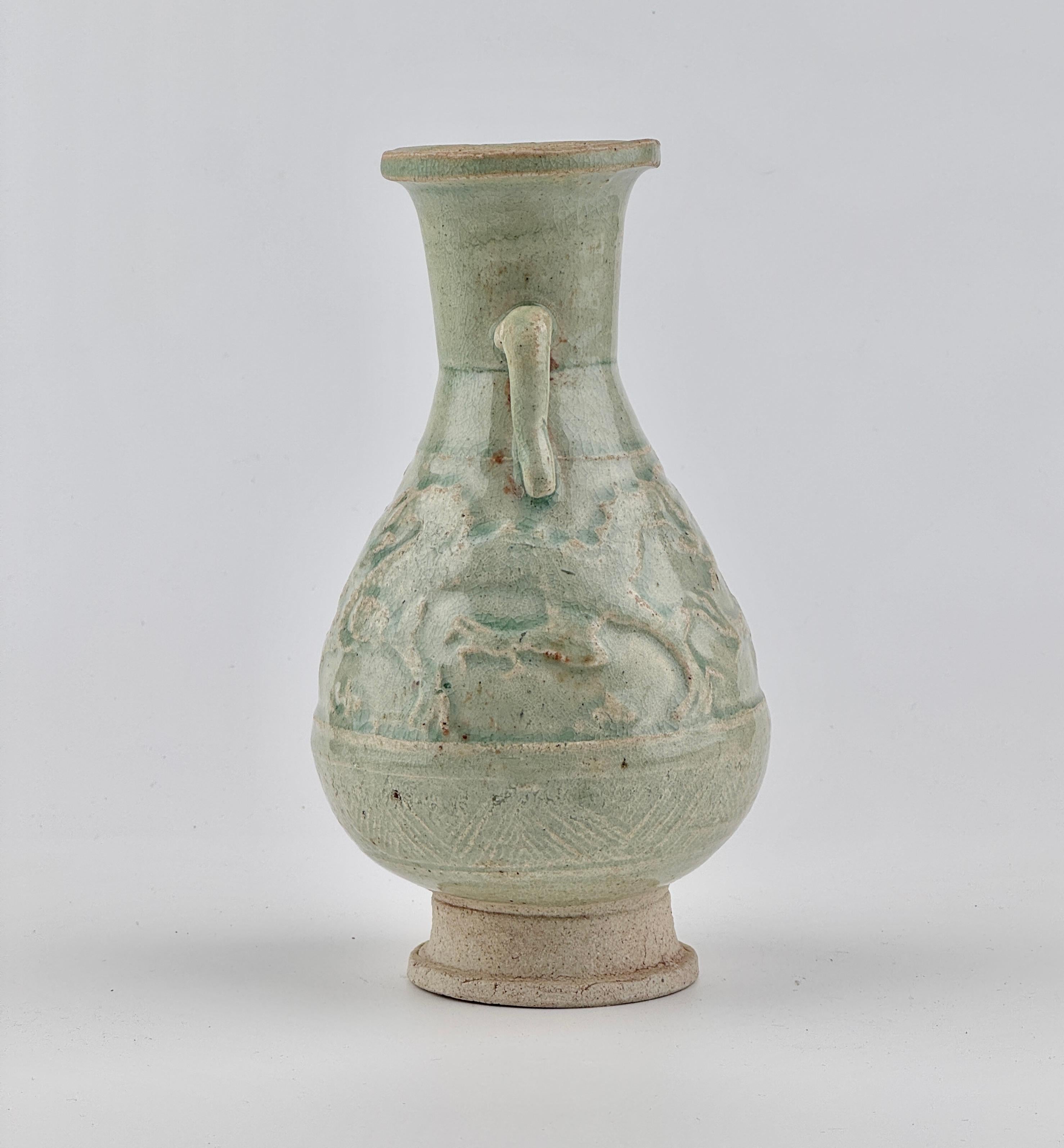 Glazed White Ware with two dragons, Yuan Dynasty, 13-14th century For Sale