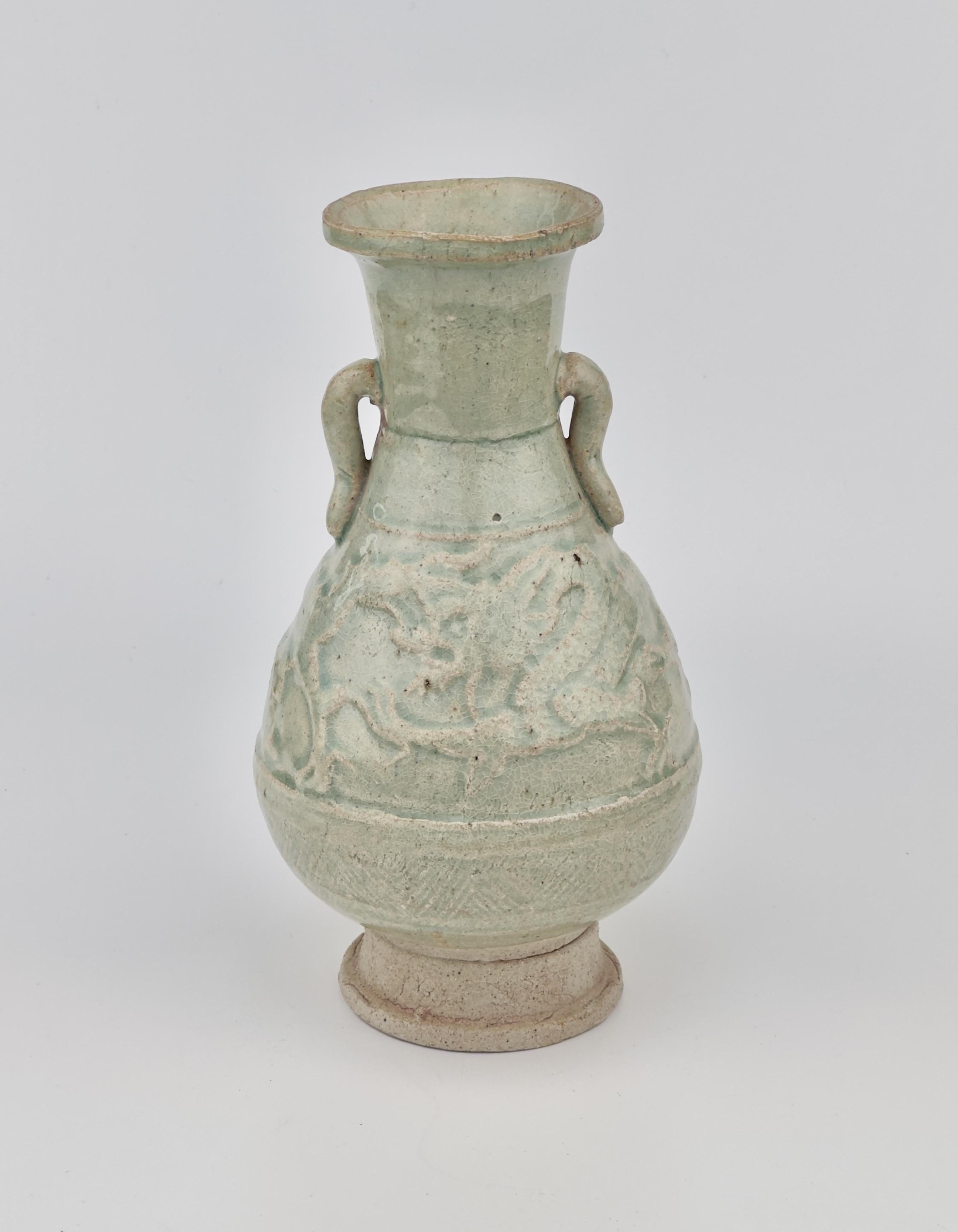 Glazed White Ware with two dragons, Yuan Dynasty, 13-14th century For Sale