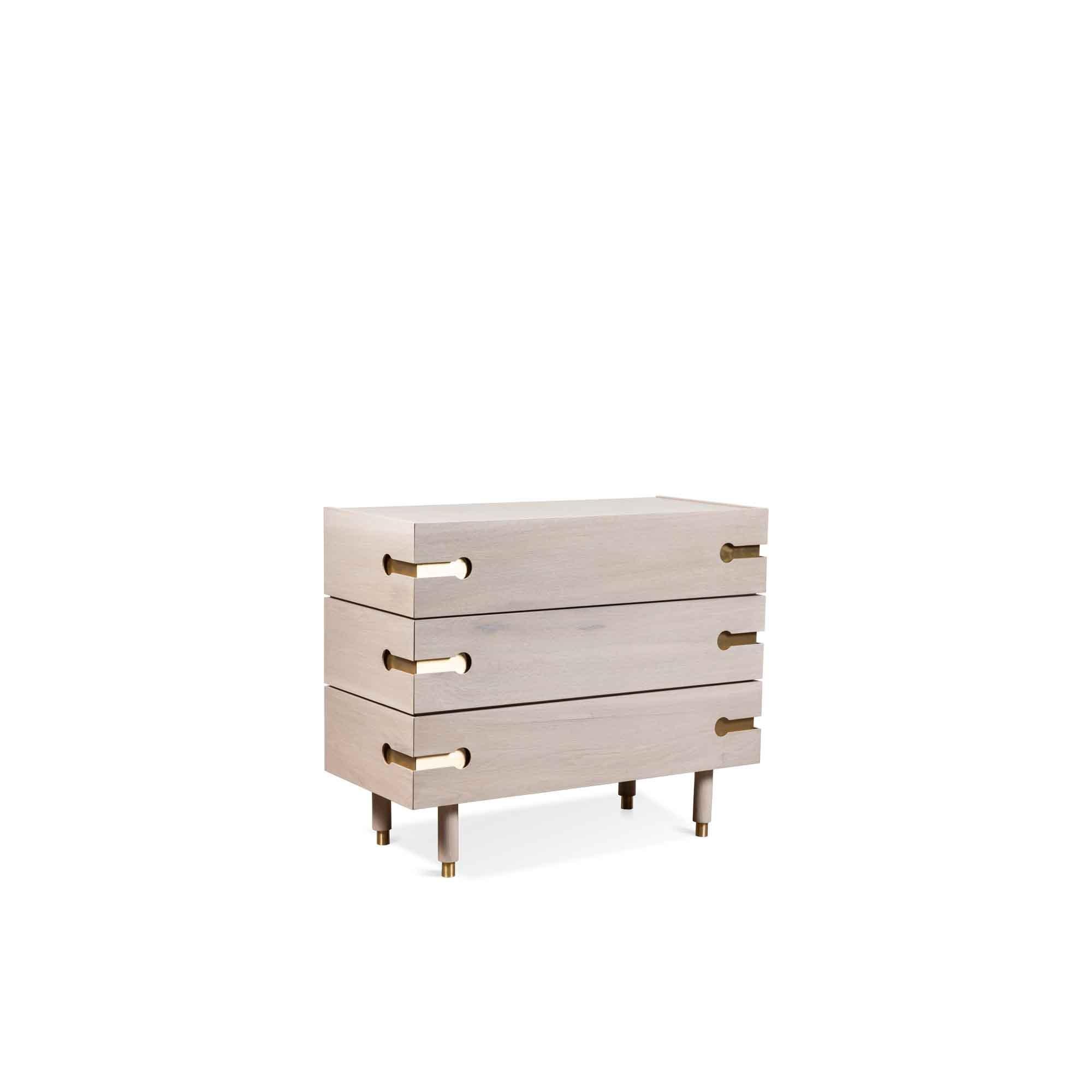 The Niguel dresser features 3 drawers, brass cap feet, and brass inlaid details.

The Lawson-Fenning Collection is designed and handmade in Los Angeles, California. Reach out to discover what options are currently in stock.