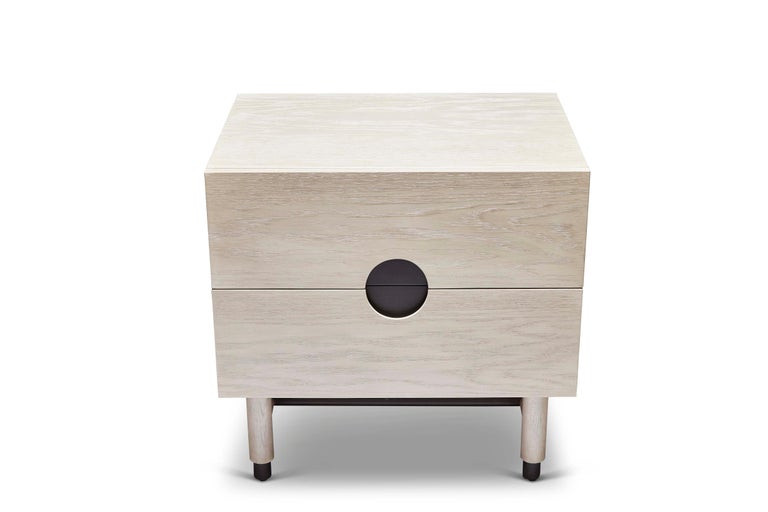 The Niguel nightstand features two drawers. Details include leveling brass cap feet, a brass stretcher on the base, lacquered interior and inset brass hardware. 

The Lawson-Fenning Collection is designed and handmade in Los Angeles, California.