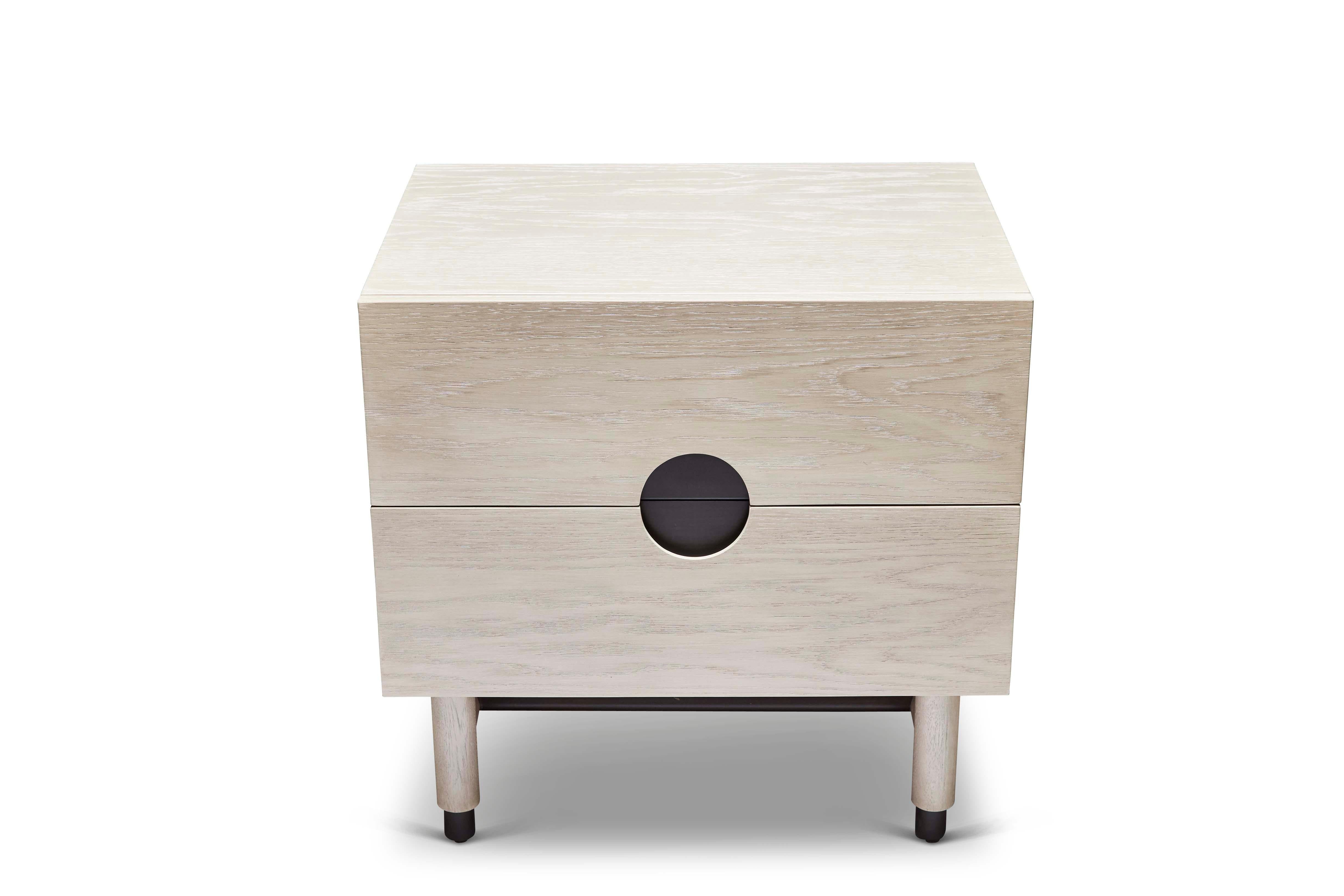 The Niguel nightstand features two drawers. Details include leveling brass CAP feet, a brass stretcher on the base, lacquered interior and inset brass hardware. 

The Lawson-Fenning Collection is designed and handmade in Los Angeles, California.