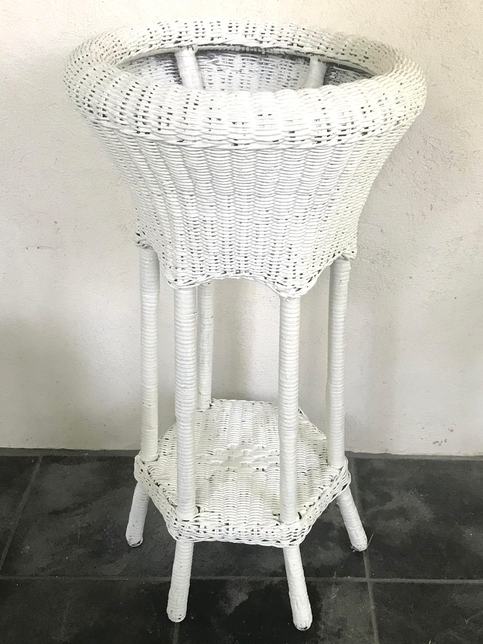 white wicker plant stand vintage