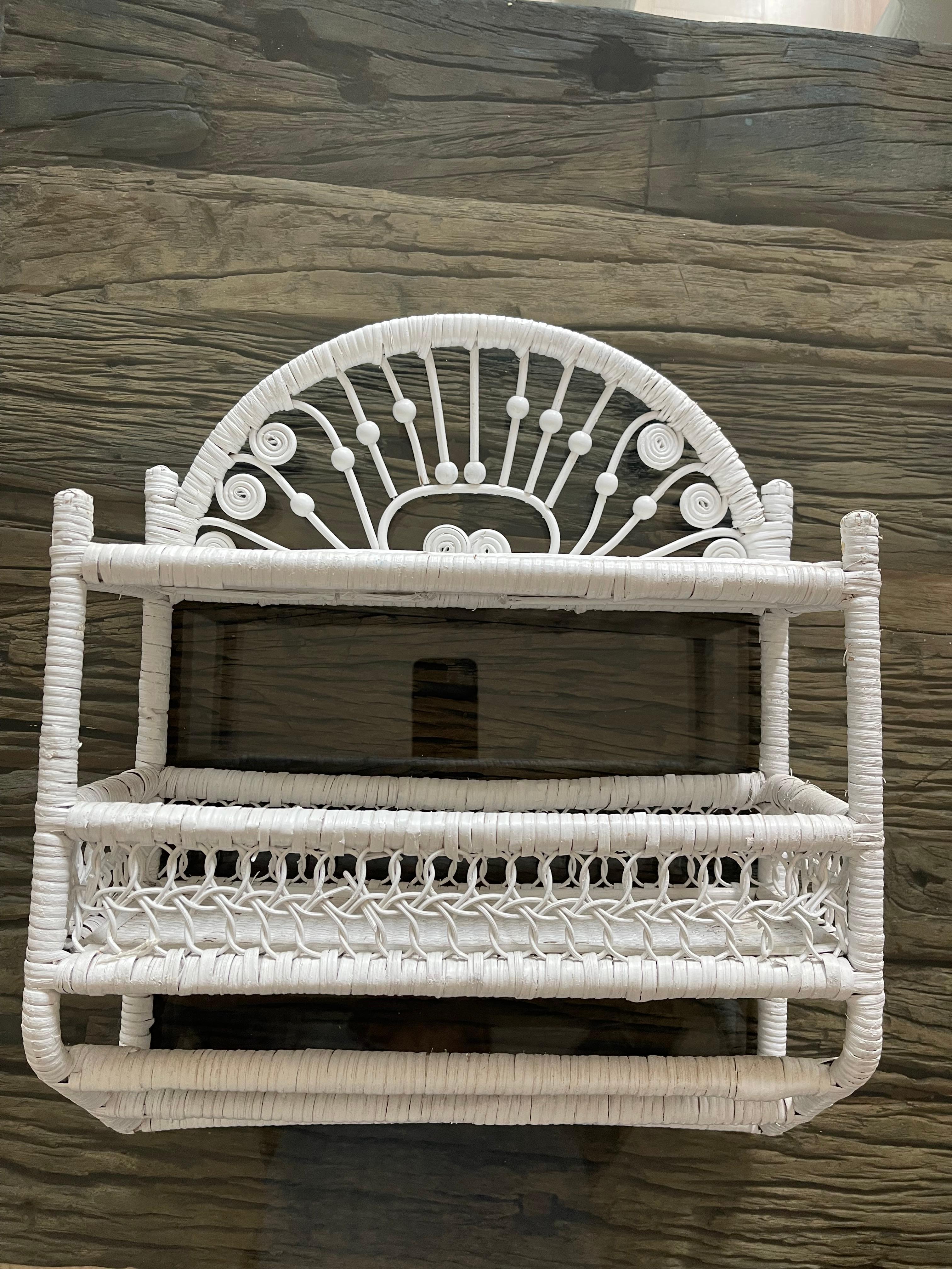 Cute small handmade wicker shelf, painted white.