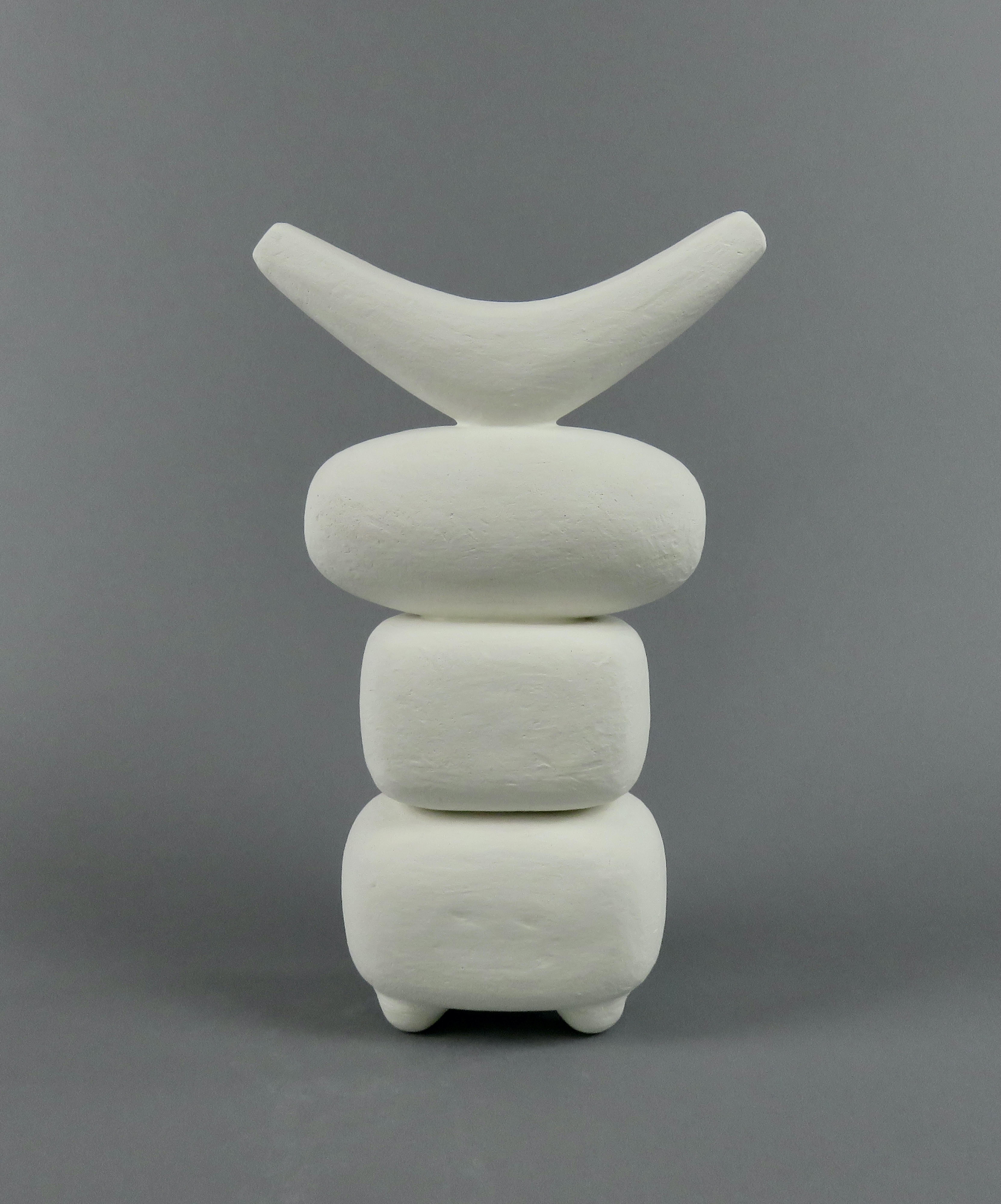 A tall, hand built ceramic Modern TOTEM, created by artist Helena Starcevic, this is one in an ongoing study of the totemic form. Here, there are 4 separate parts hand-formed and attached with 4 small feet. The specially formed and angled top is
