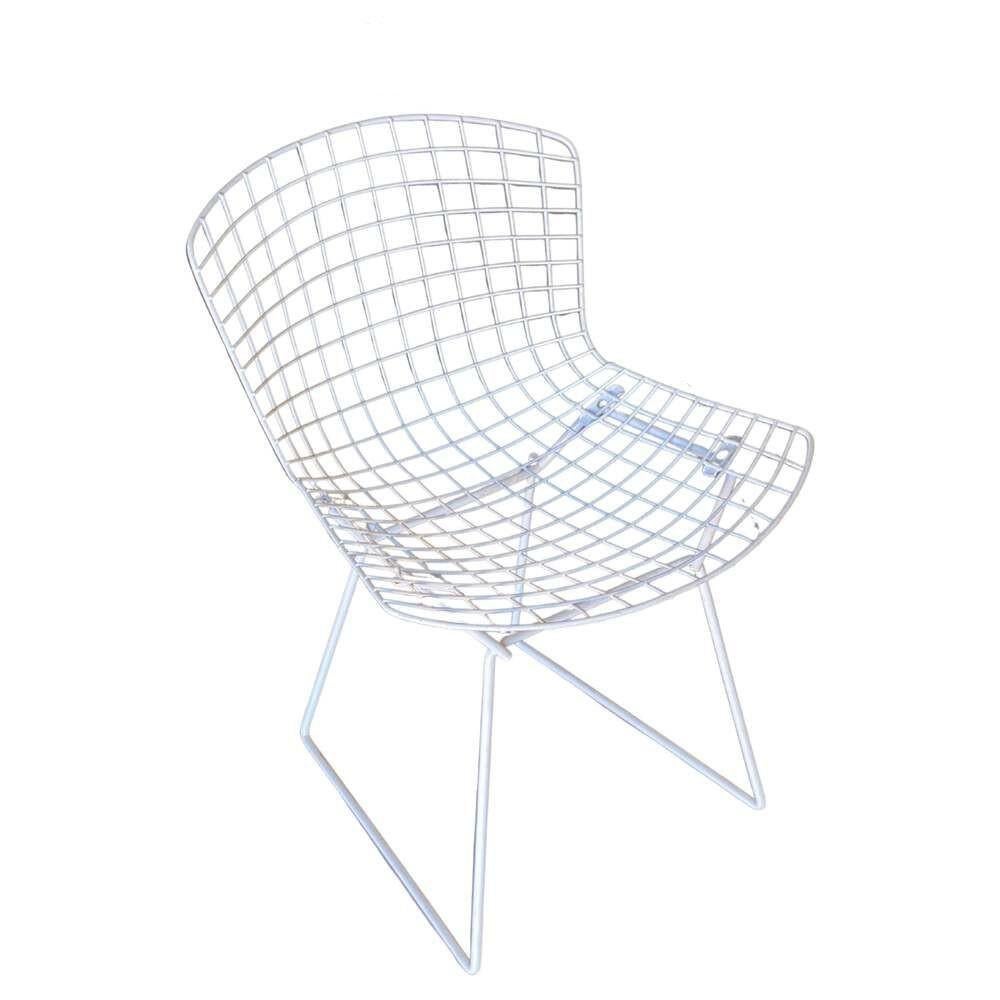 The Bertoia Side Chair is an icon of mid-century modern design. Bertoia found sublime grace in an industrial material, creating a design that works with every decor, in every room. This set of four chairs come refinished in their original, white