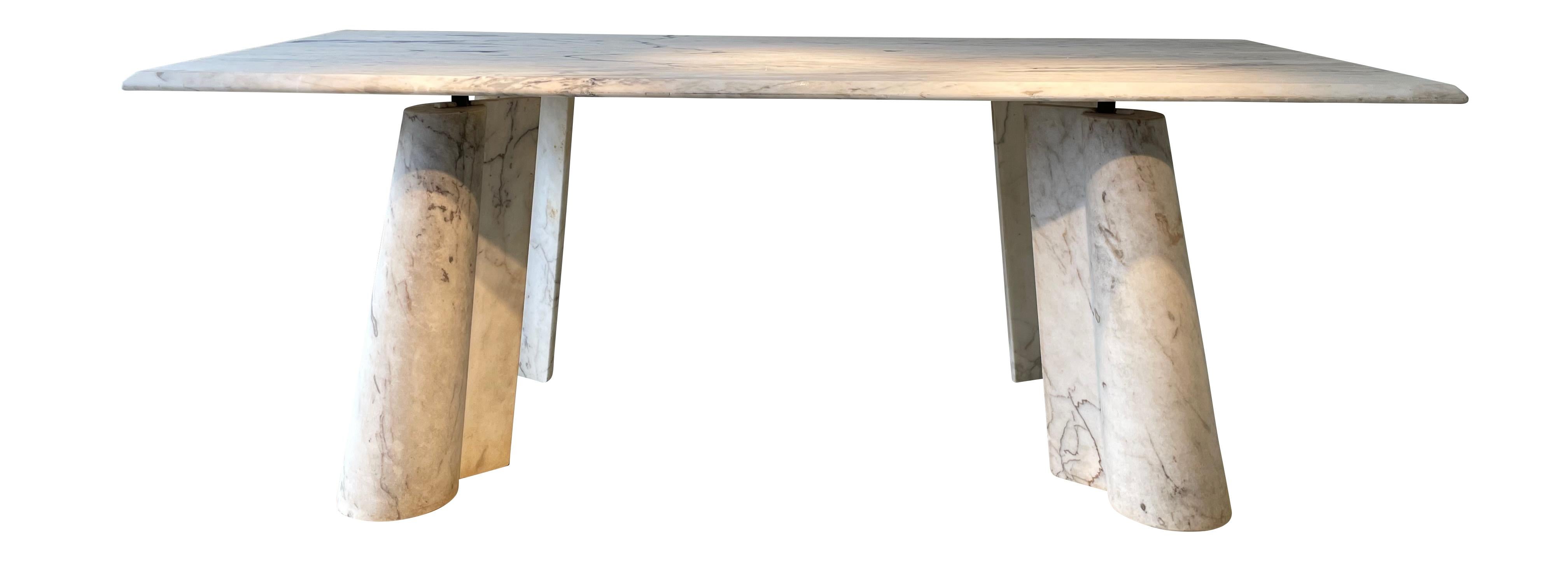 1970's Spanish exceptional all marble center hall table.
Top floats above yet supported by bronze pods that join the splayed marble legs.
Legs are column designed with adjoining rectangles.
Can also be used as a desk or dining table.
