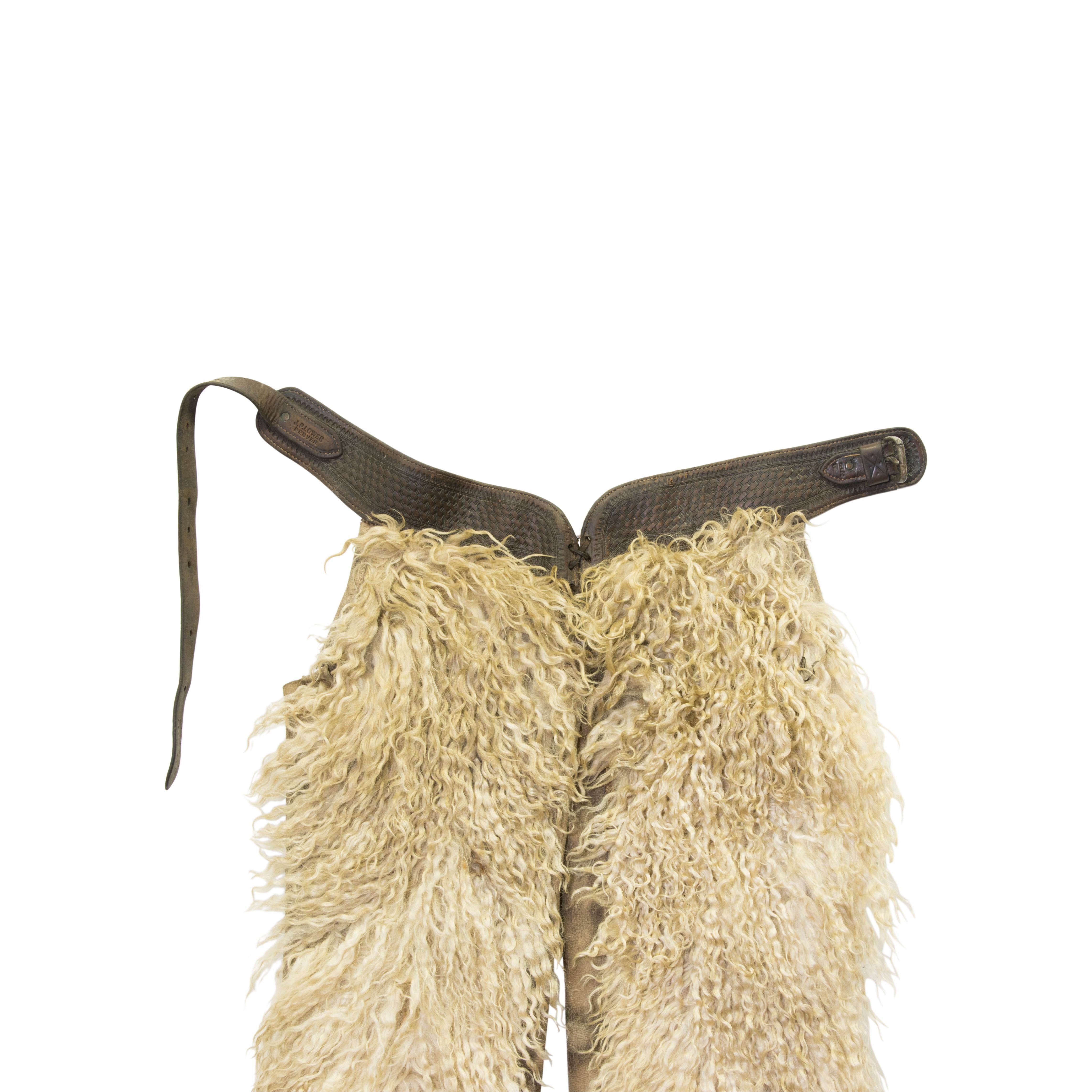 White wooly chaps by J. P. Lower, Denver. Basket weave belt, inside pockets.

Period: Early 20th century

Origin: Colorado, United States

Size: 36