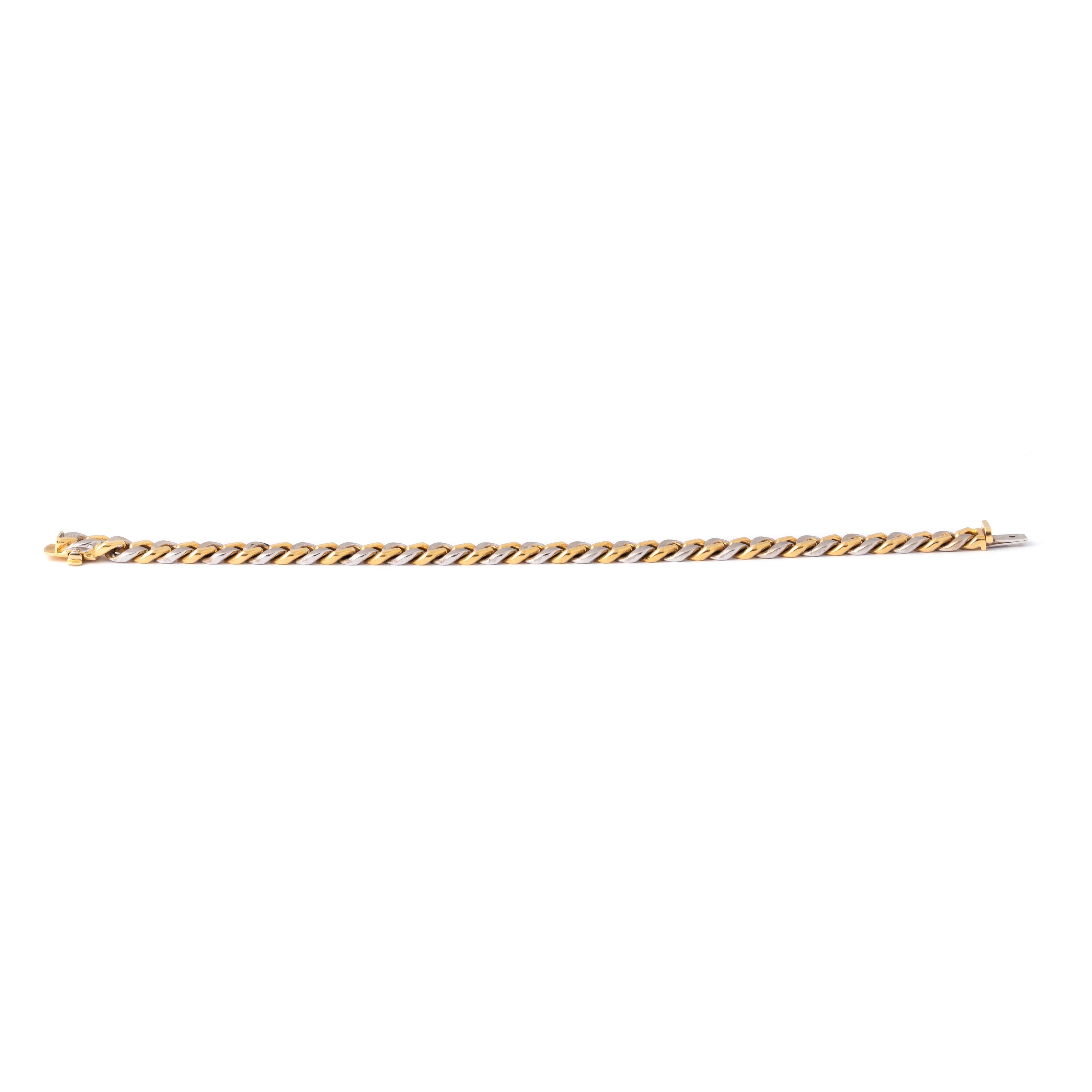 White & Yellow 18K Gold Chain Bracelet.

Adorn your wrist with timeless elegance and sophistication with this exquisite White & Yellow 18K Gold Chain Bracelet. Crafted to perfection, the bracelet seamlessly blends the luster of white and yellow