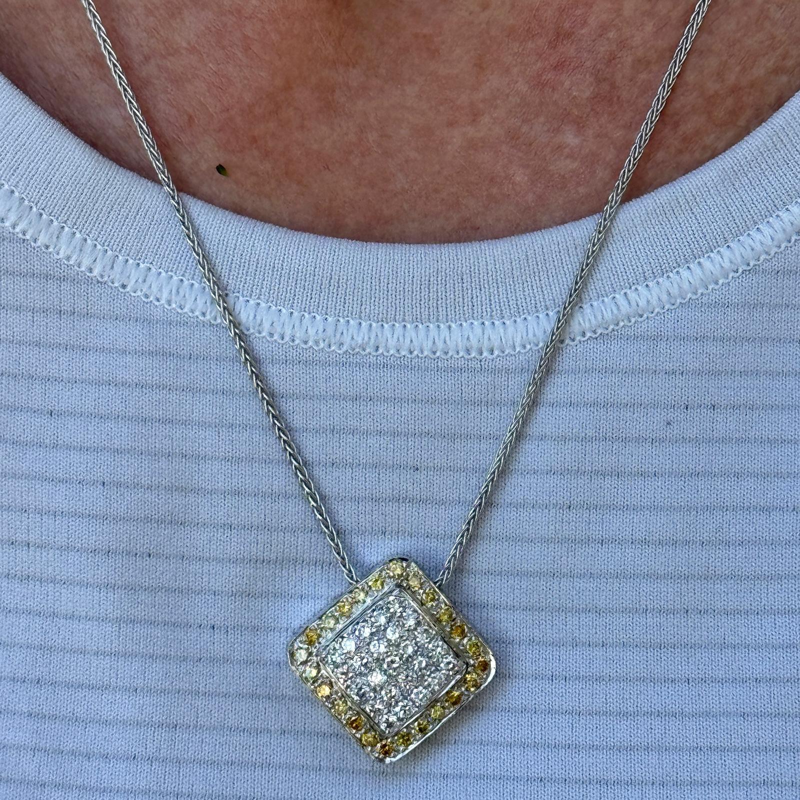 Elegant 18K two-tone gold square diamond pendant featuring a striking contrast of diamonds in a modern geometric design. The pendant is set with 25 round brilliant-cut white diamonds totaling approximately 0.75 carats, graded H-I color and SI