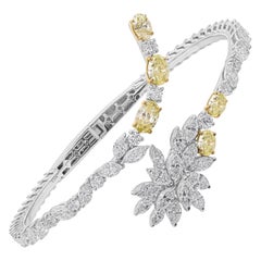 Bracciale a bracciale in oro bianco e giallo con diamanti floreali