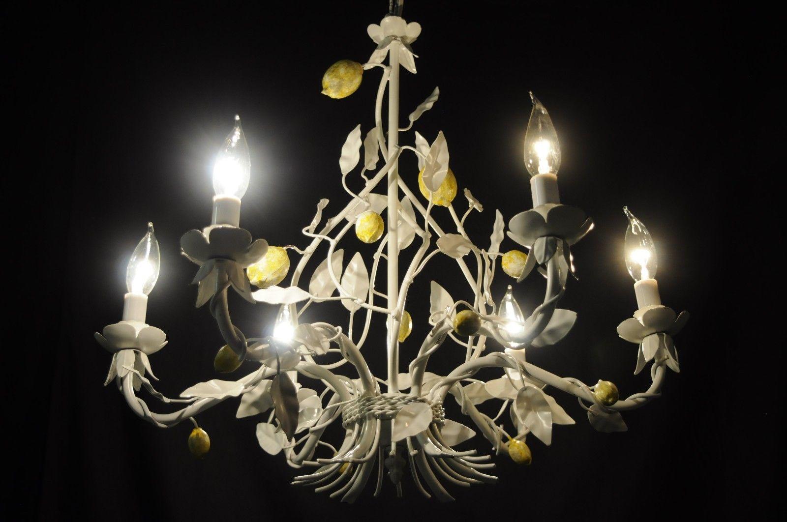 Vintage white and yellow lemon chandelier, Italian Hollywood Regency. Item features scrolling white painted metal frame, yellow lemon accents, leafy bobeche, six scrolling arms, and six lights, circa mid-20th century, Italy. Measurements: 21