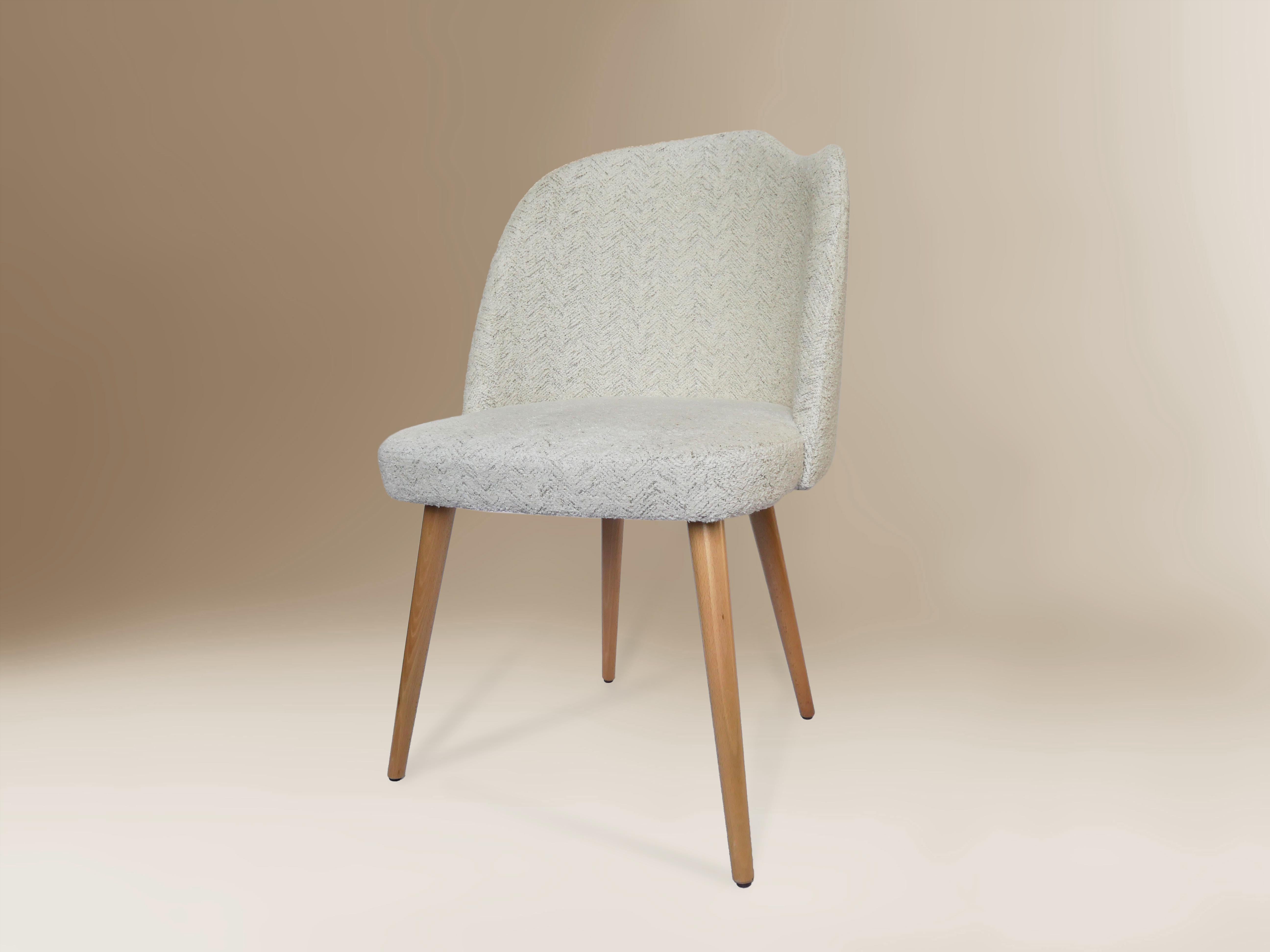 White Yves chair by Dovain Studio
Dimensions: H 85 x W 54 x D 54 x SH 49 cm
Materials: velvet, wood

Dovain studio
Creative direction by Sergio Prieto, a Spanish artist-designer who was born in Talavera de la Reina in 1994. He dedicated himself