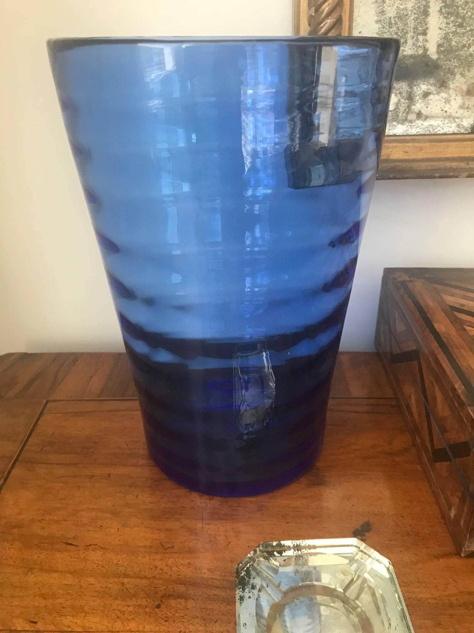 A wonderful deep blue ribbed Whitefriars vase in sanctuary blue, designed by William Weston.