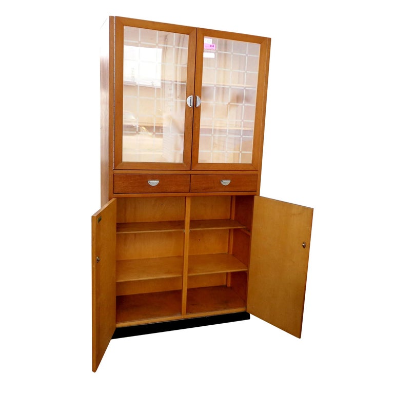 Whiteleaf Furniture Co 70' wall cabinet.

Whiteleaf Furniture is a UK based furniture Co primarily manufacturing kitchen and bedroom furniture.

Vintage cabinet buffet in teak on a plinth base with nickel pulls featuring upper shelving with