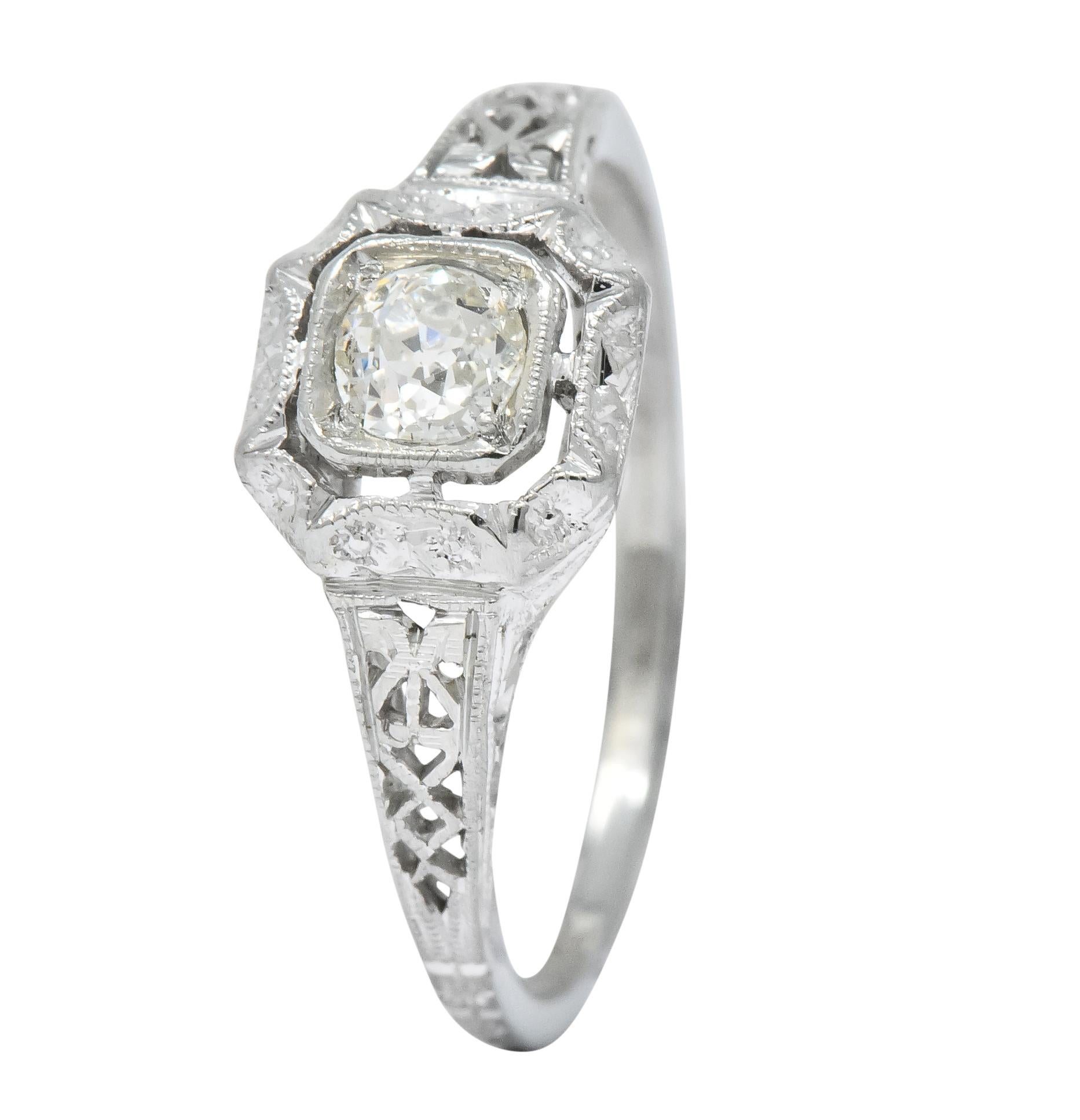 Centering an old European cut diamond weighing 0.23 carat I color and VS clarity

In a pierced square form head and shoulders

With engraved floral detail

Fully signed Whiterose and stamped 18K

Ring Size: 6 & Sizable 

Circa 1915

Top measures 7.7