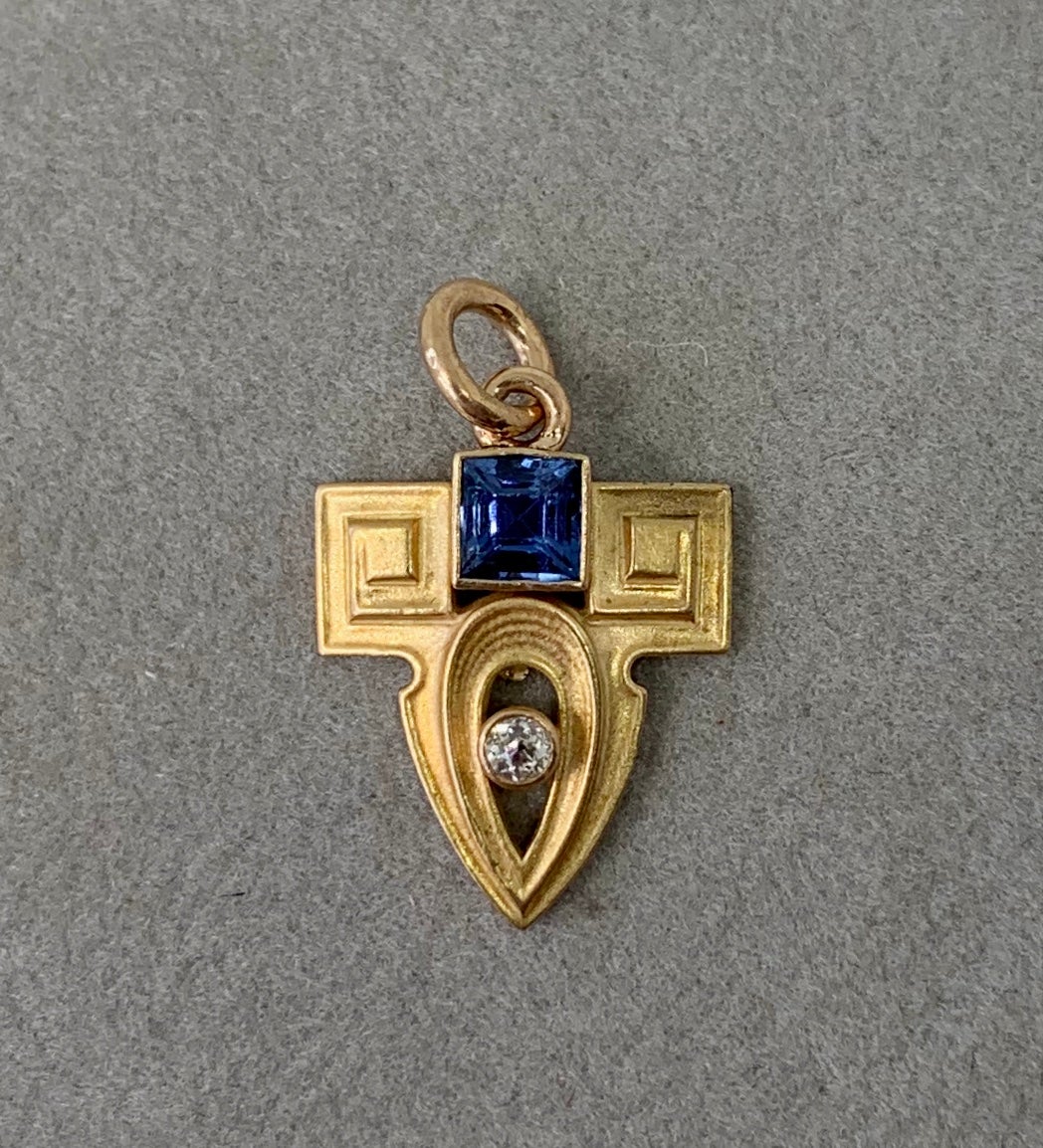 This is a stunning antique Art Deco - Victorian - Edwardian Sapphire Diamond Lavaliere Pendant in 14 Karat Gold by the esteemed American jewelry maker Whiteside and Blank.  The beautiful pendant has a central square cut fine blue sapphire of
