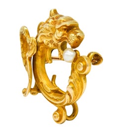 Whiteside and Blank Art Nouveau Baroque Pearl 14 Karat Gold Winged Lion Brooch