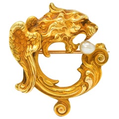 Whiteside and Blank Art Nouveau Baroque Pearl 14 Karat Gold Winged Lion Brooch