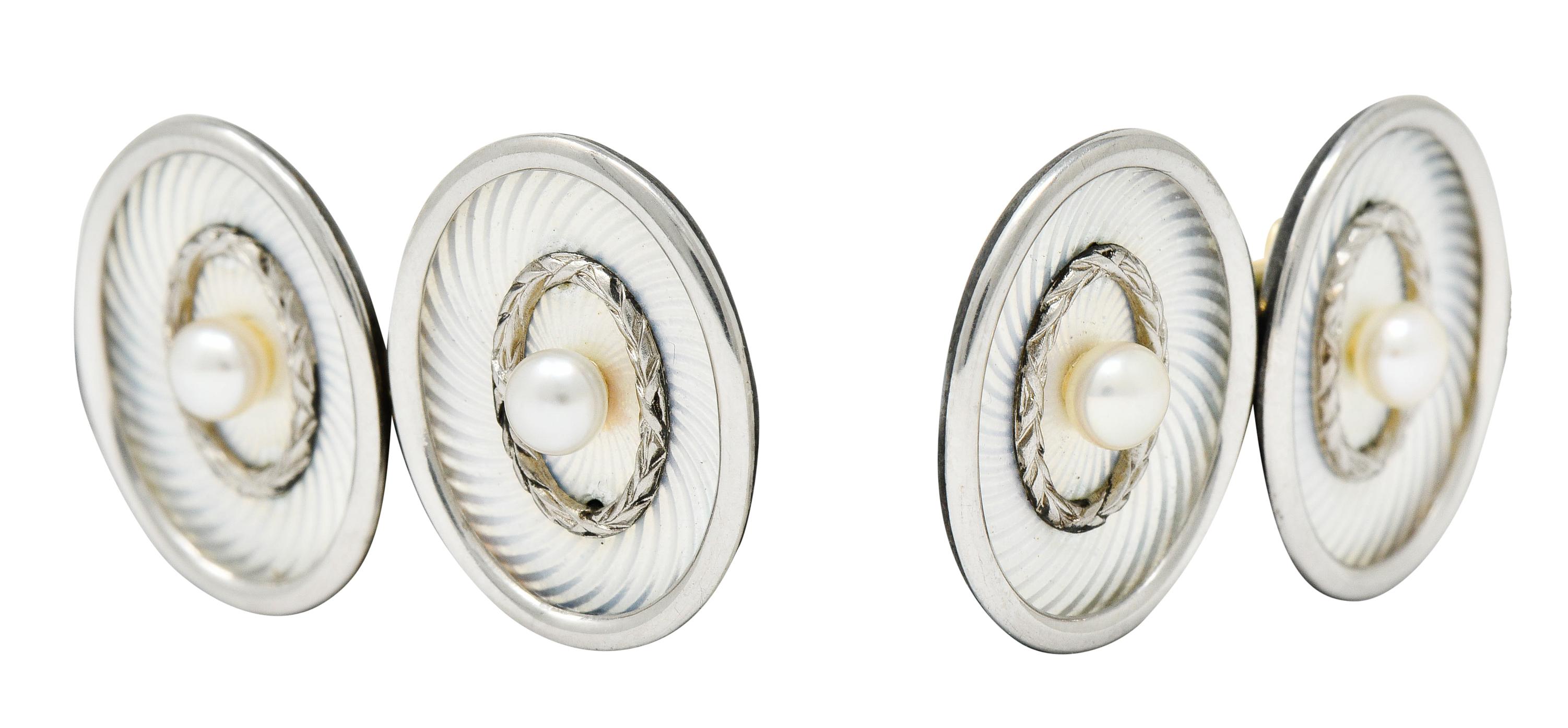 Retro Whiteside and Blank Pearl Enamel Platinum-Topped 18 Karat Gold Laurel Cufflinks