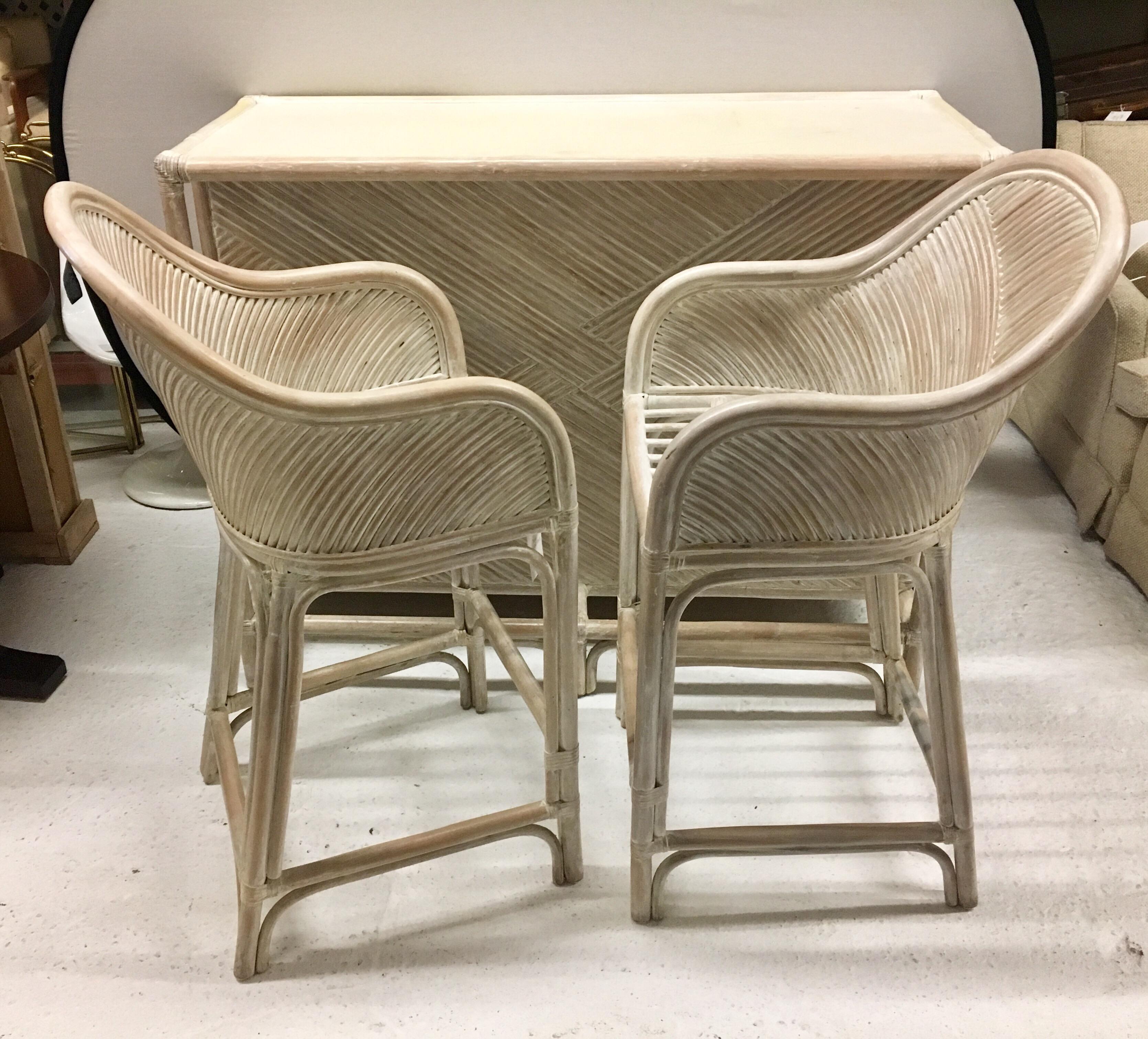 You'll swear you are in Palm Beach, but you're not! Whitewashed three piece dry bar set. Dimensions of bar are below and chairs measure 21 x 23 x 43 tall x 27.5 seat height x 35 inch arm height.
