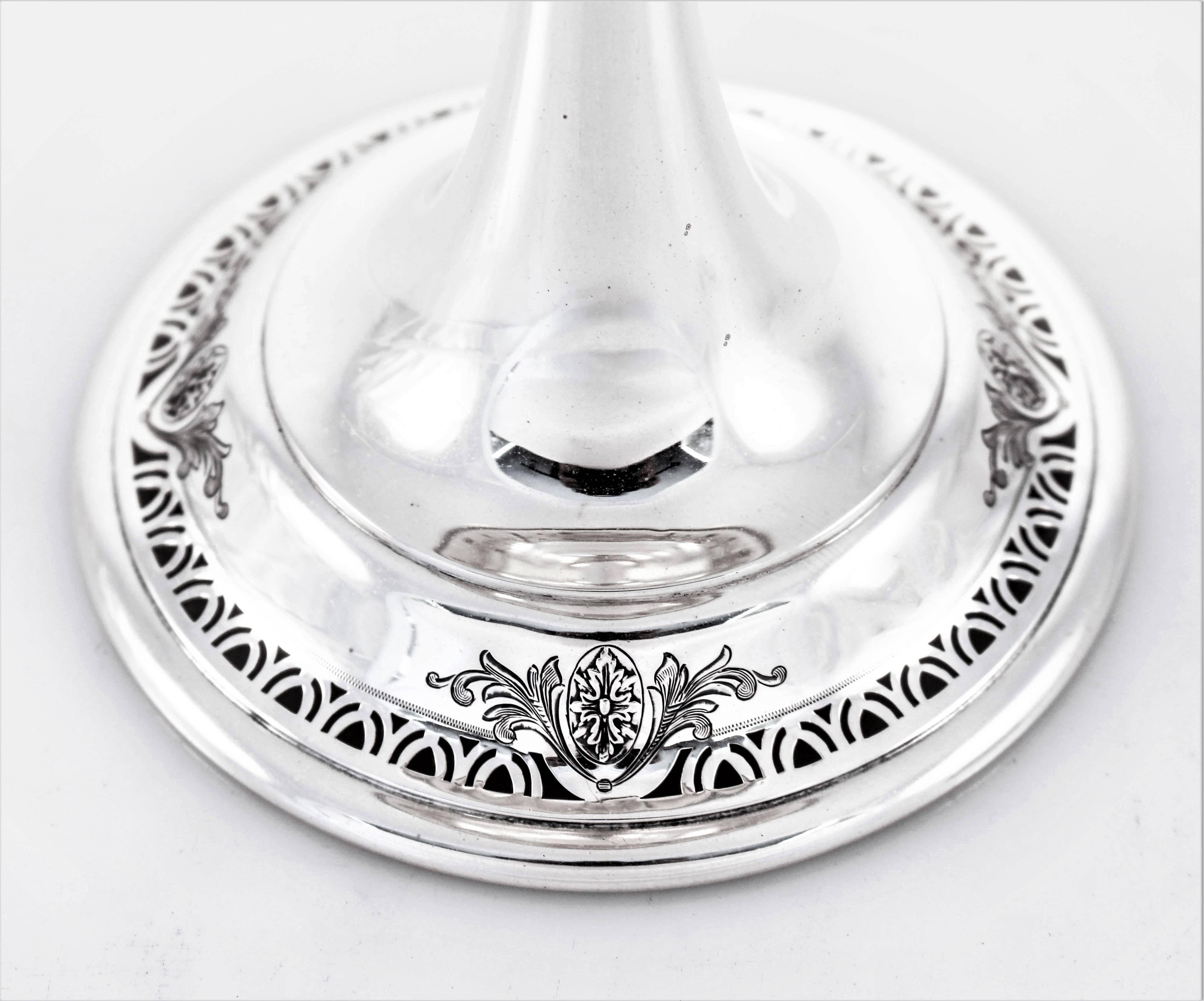 There’s something special about the silhouette of this compote; soft and feminine. Pretty etchings and openwork decorate the top rim as well as the base (not weighted). The top rim also folds over, giving the center a scooped out -like shape. This