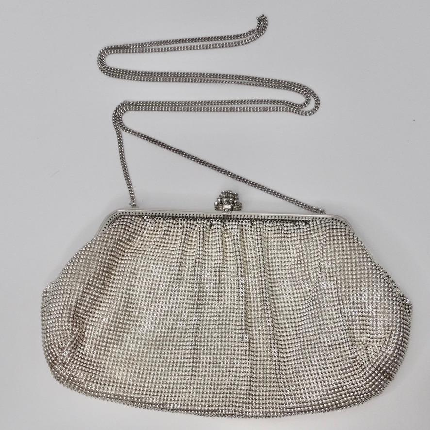 Adorable vintage Whiting & Davis silver chainmail clutch! Complete your going out look effortlessly with this timeless and versatile chainmail clutch. Features a gorgeous rhinestone-encrusted clasp-fastening closure with a detachable strap which