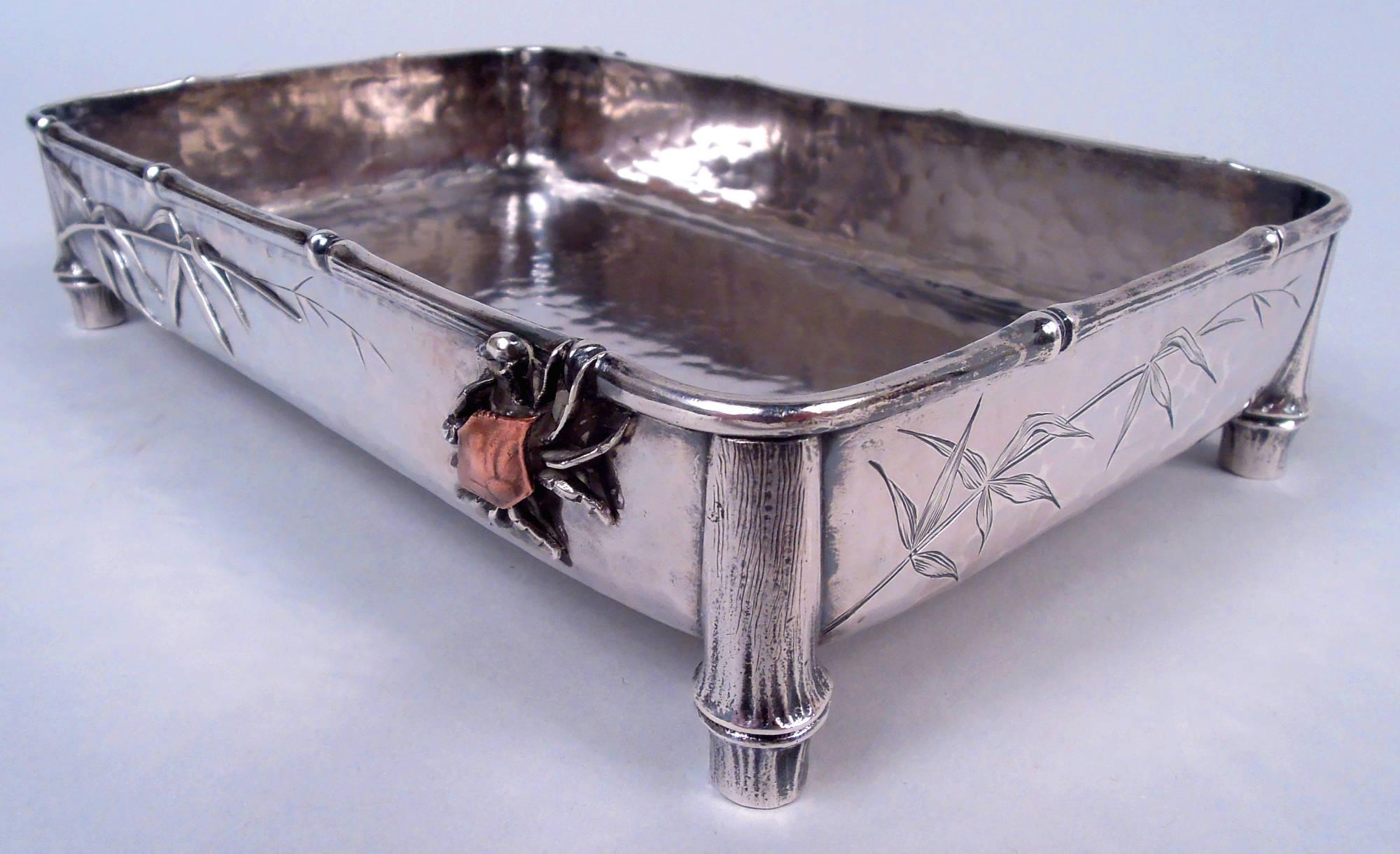 Japonesque mixed metal sterling silver bowl. Made by Whiting Mfg. Co. in New York, ca 1885. Rectangular with straight sides; bamboo-stalk rim and corner supports. On sides, applied and engraved leafing bamboo branches. Also applied are two crabs