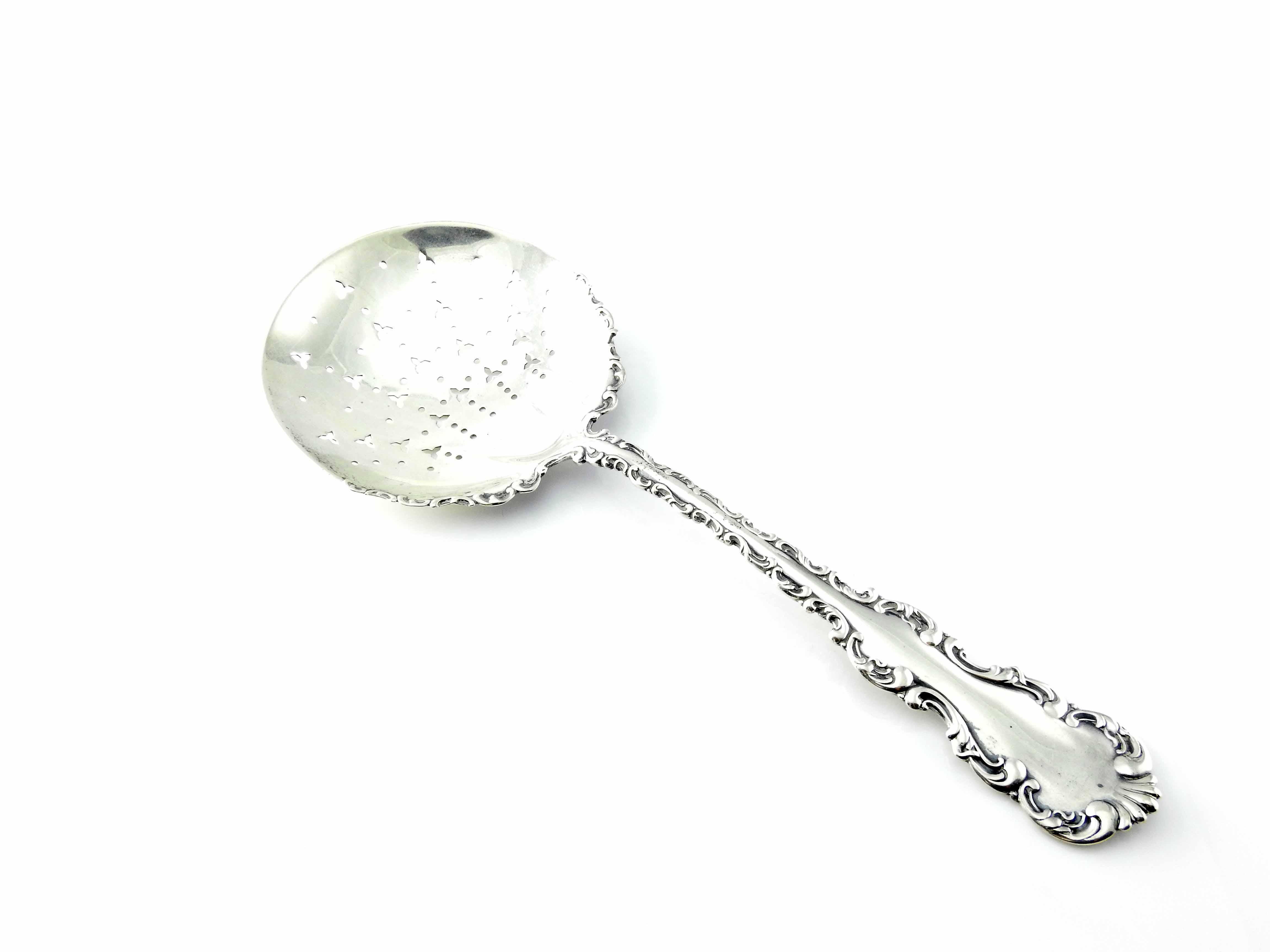 Antique sterling silver pierced pea serving spoon by Whiting Manufacturing Co in the Louis XV pattern.

Beautiful piece from 1891 in the Whiting Manufacturing Co of NY, NY. No monogram.

Measures 8 5/8