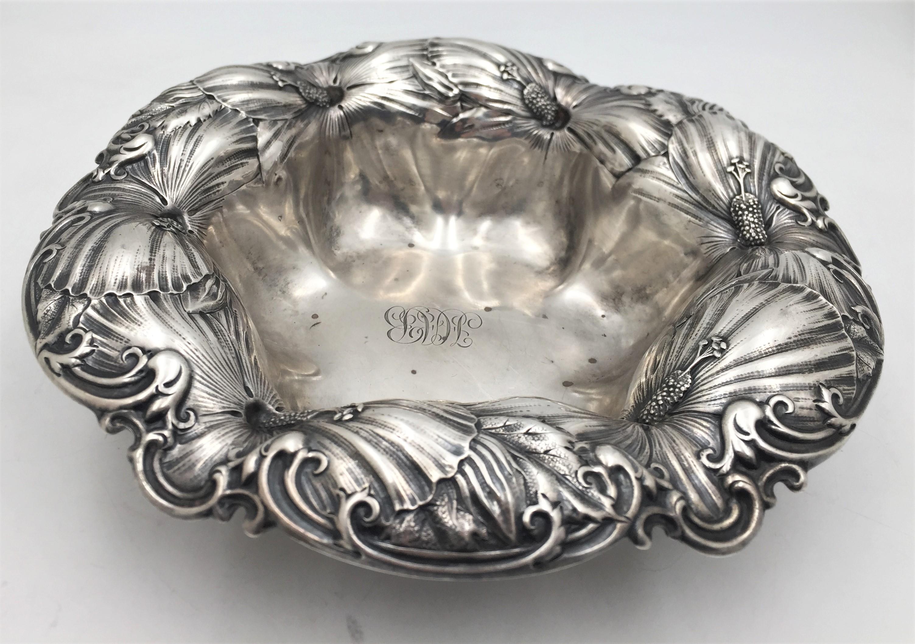 Whiting, sterling silver centerpiece or fruit bowl in Art Nouveau style, with beautiful, flowing floral motifs adorning the rim. It measures 12 1/2'' in diameter by 3 1/2'' in height, weighs 20.5 troy ounces, and bears hallmarks as shown.