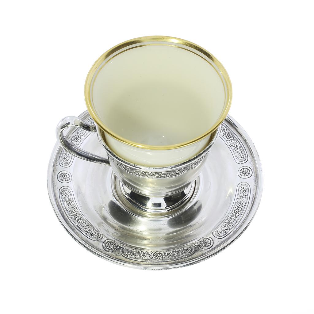A Wonderfully Diminutive Demitasse Sterling Silver and Lenox Porcelain Tea or Espresso Cup with Saucers Set of 4.

Metal Type: Sterling Silver

Hallmarks: Makers Mark, B 811

Metal Finish: Polish, Natural Patina

Measurements:
4) 2 3/4