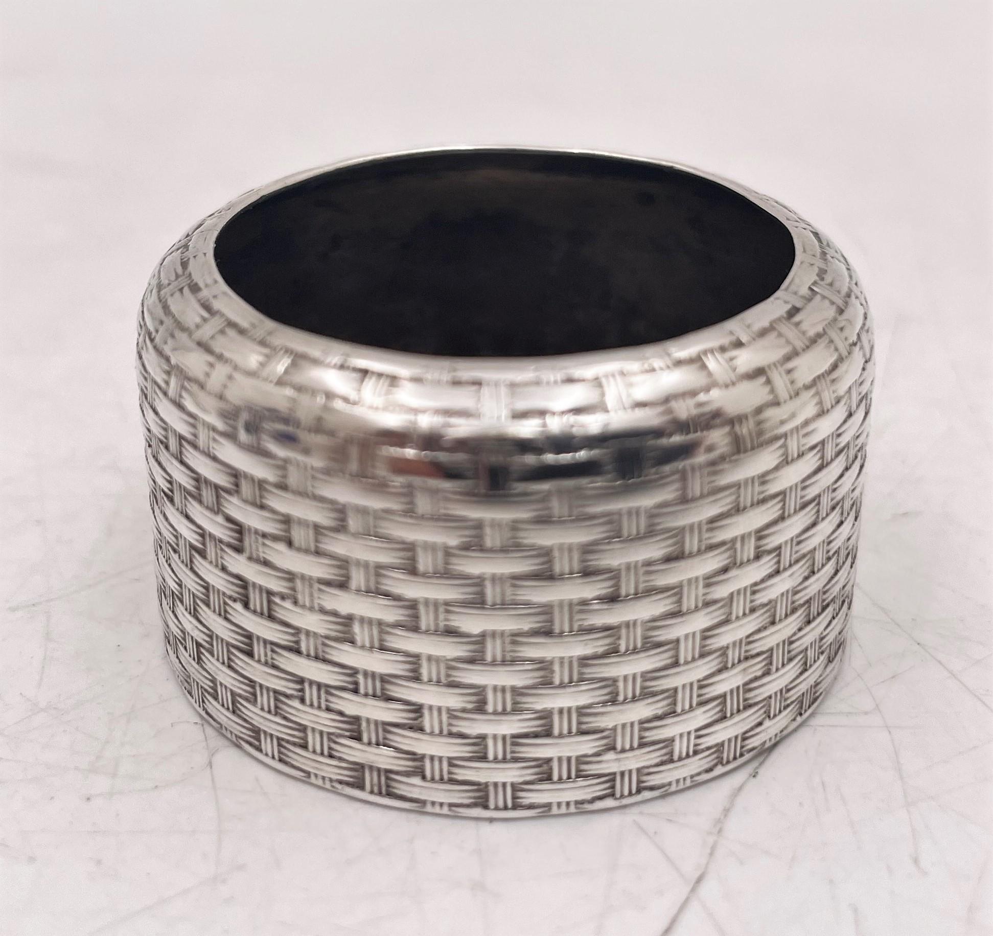 Whiting, sterling silver set of 4 open salts, showcasing intricate weave-like pattern, measuring 1 5/8'' in diameter by 7/8'' in height and bearing hallmarks as shown. 

Originally in Massachusetts, Whiting Manufacturing Company relocated to New