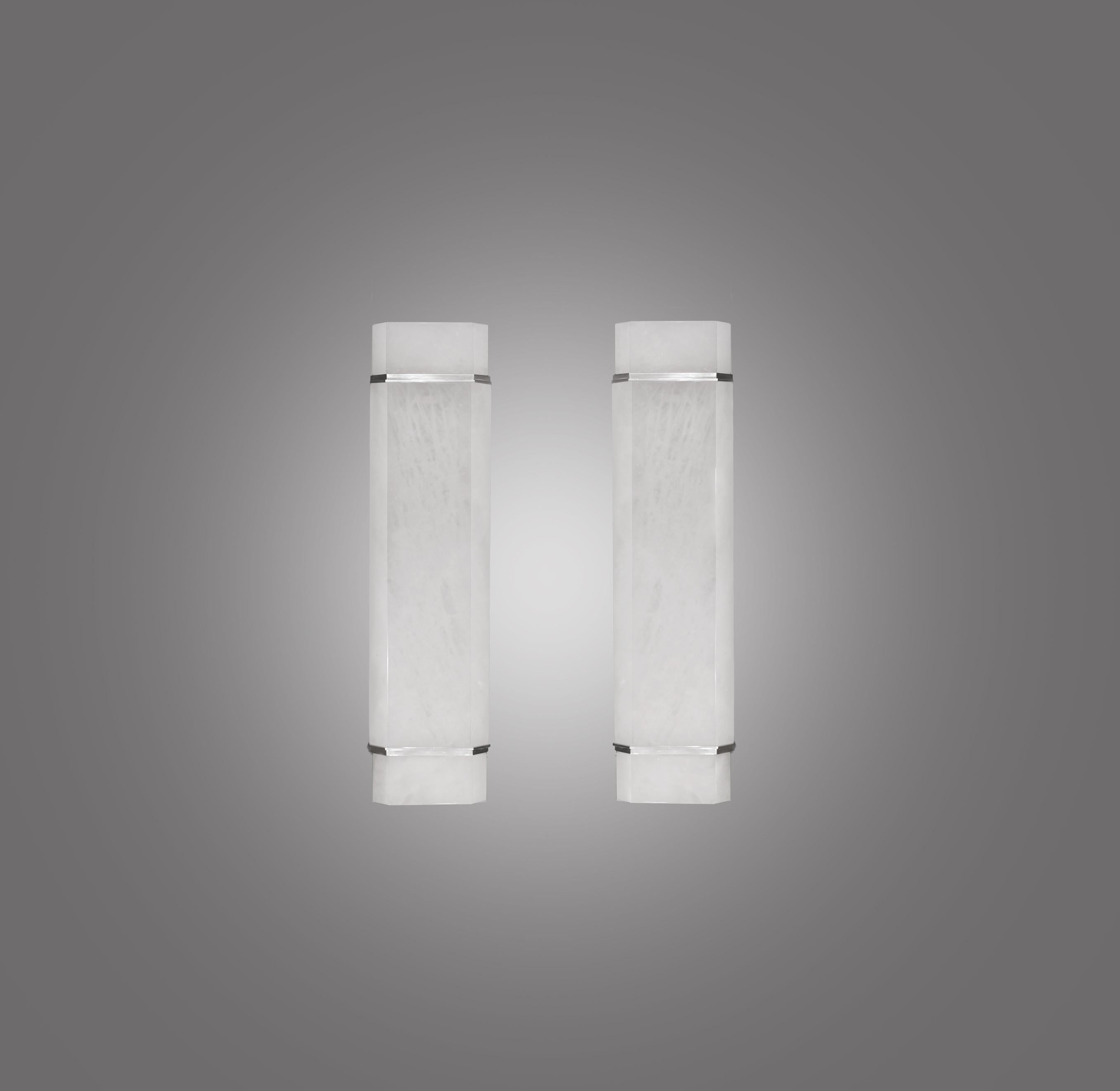 Pair of Rock Crystal Sconces with nickel plating decoration. 
Each sconce installed with two E26 sockets. Use two 80 watts long tube LED warm light bulbs. 160 watts total. 
Created by Phoenix Gallery. Custom size upon request.