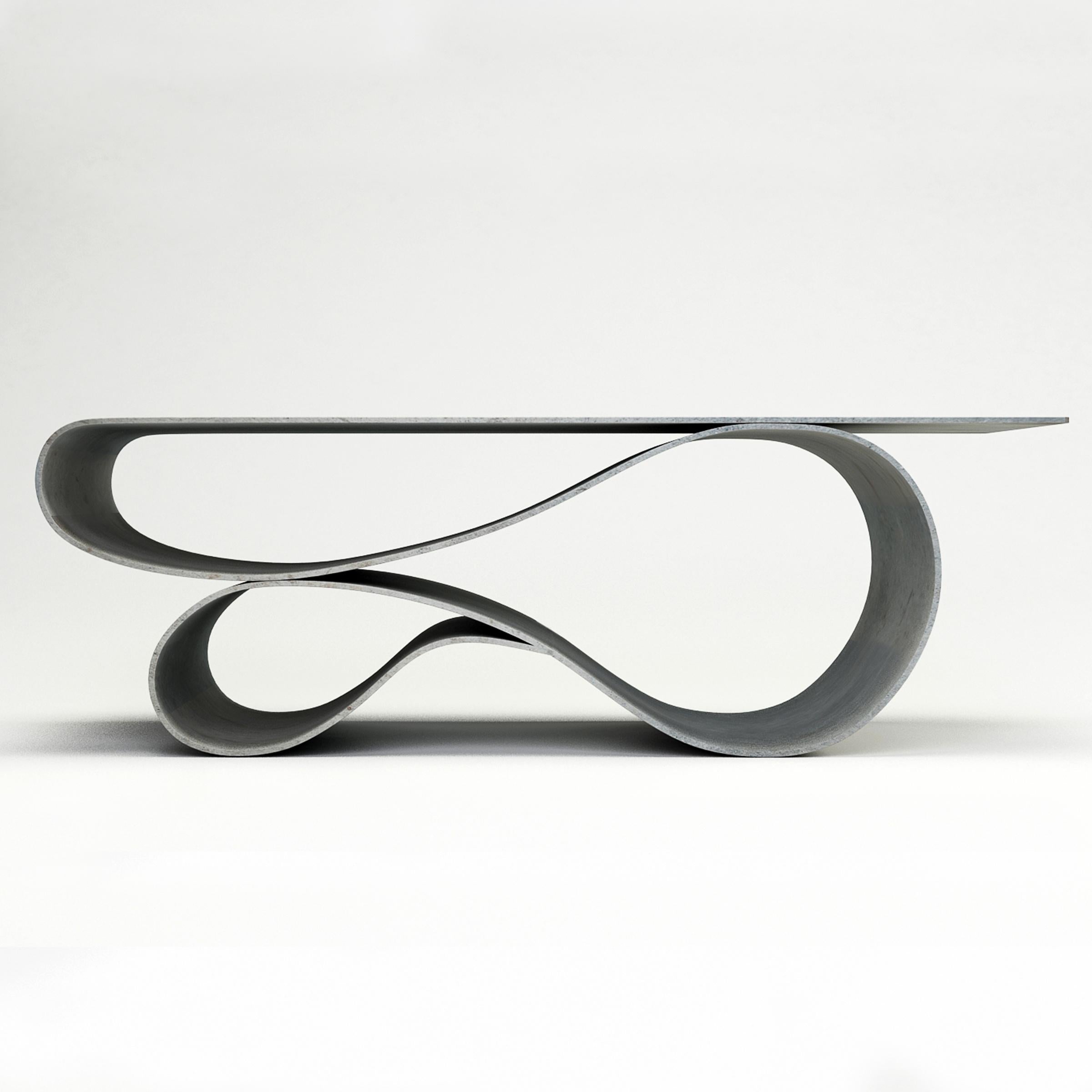 Table basse Whorl de Neal Aronowitz Design
Dimensions : D 61 x L 139,7 x H 45,7 cm
Matériaux : Mortier de ciment pigmenté, béton.
La taille, les couleurs et la finition peuvent être modifiées et personnalisées. 

La table basse Whorl est un
