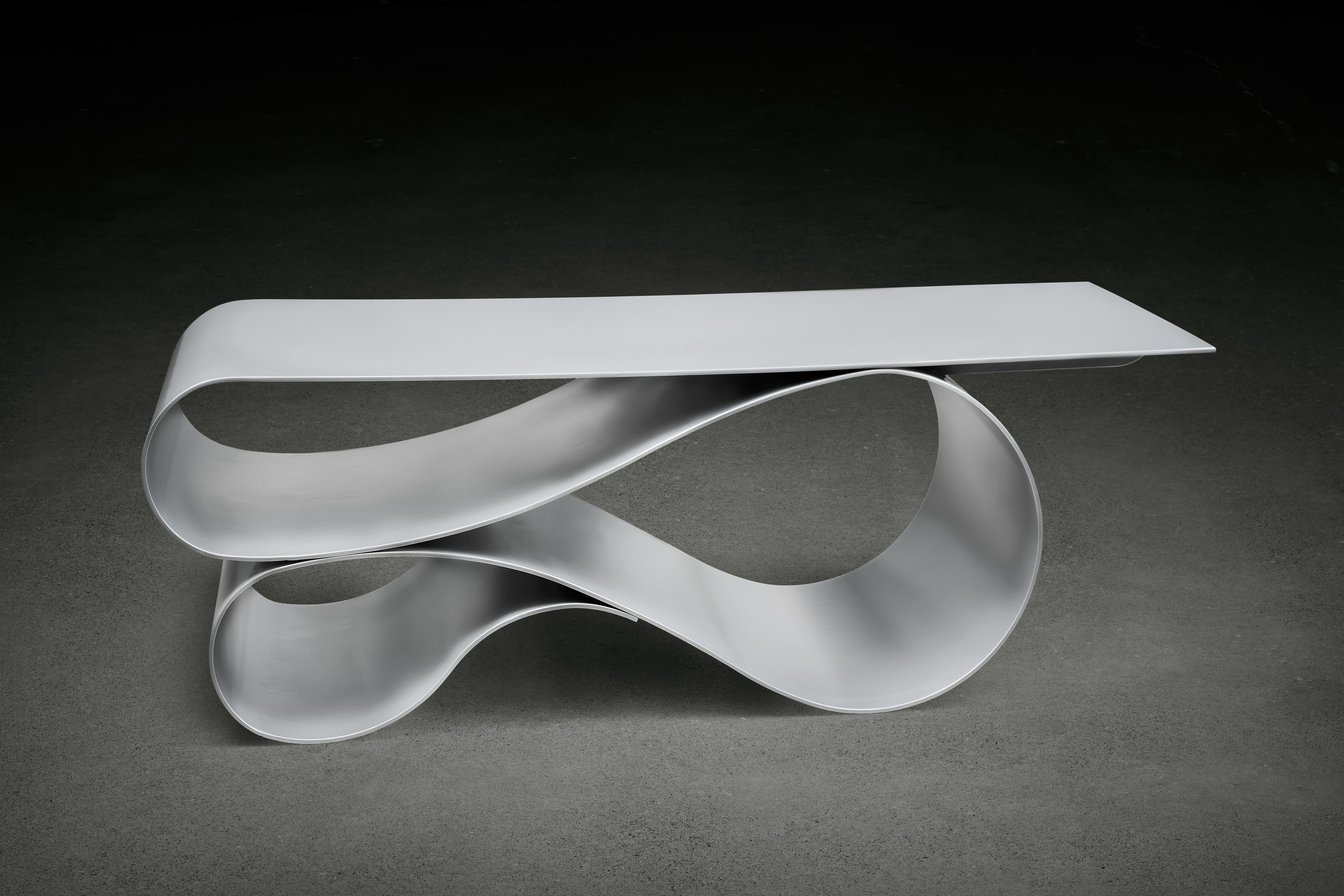 Whorl coffee table in powder coated aluminum by Neal Aronowitz Design
Dimensions: D 61 x W 139.7 x H 45.7 cm
Materials: Aluminium.
Size and color can be modified and customized. 

An elegant and powerful sculptural statement. This is a console