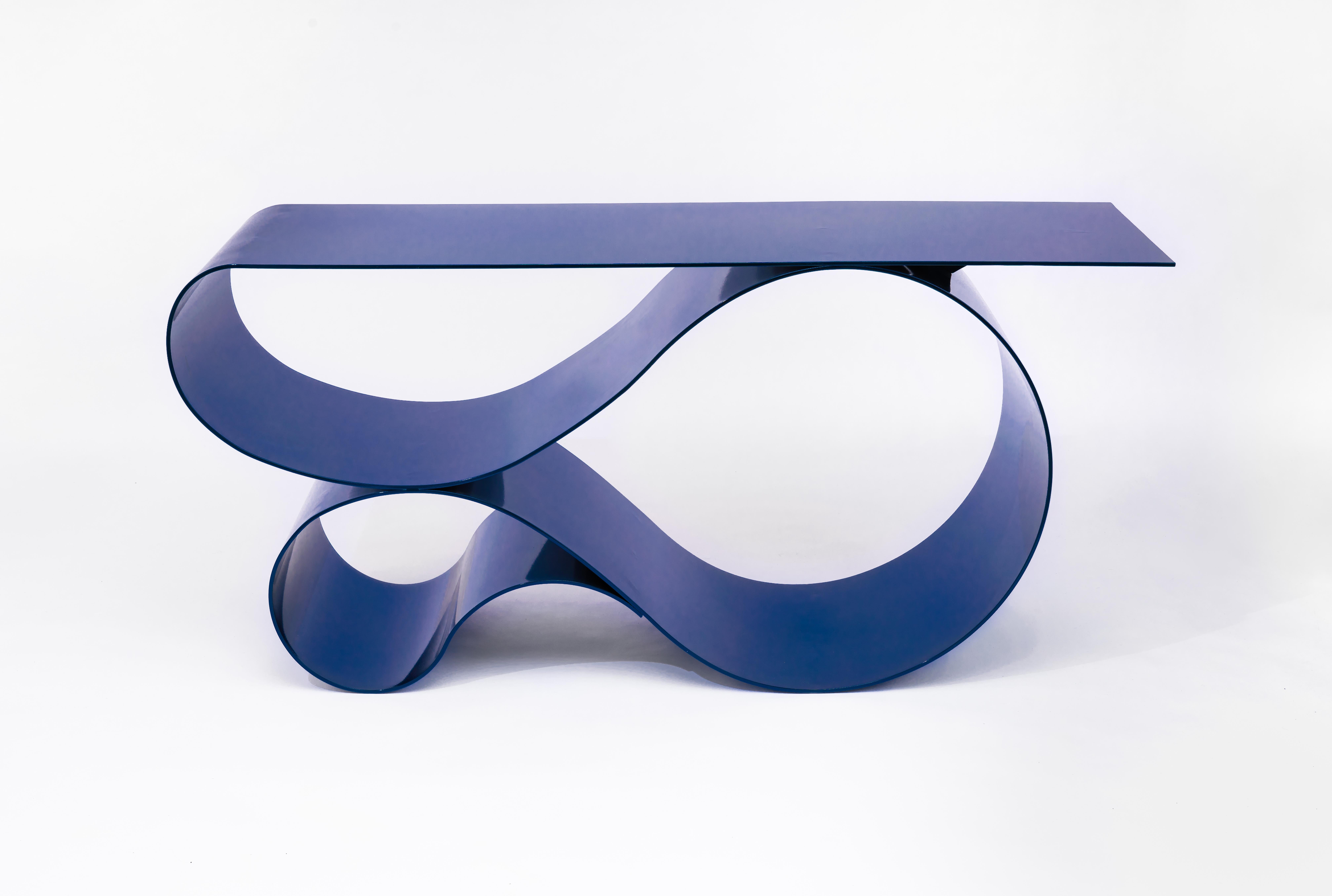 Whorl console in blue powder coated aluminum by Neal Aronowitz Design
Dimensions: D 43.2 x W 160 x H 76.2 cm
Materials: Powder coated aluminium.
Size, colors and finish can be modified and customized. 

An elegant and powerful sculptural