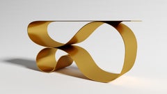 Whorl Console In Gold Powered Coated Aluminum by Neal Aronowitz