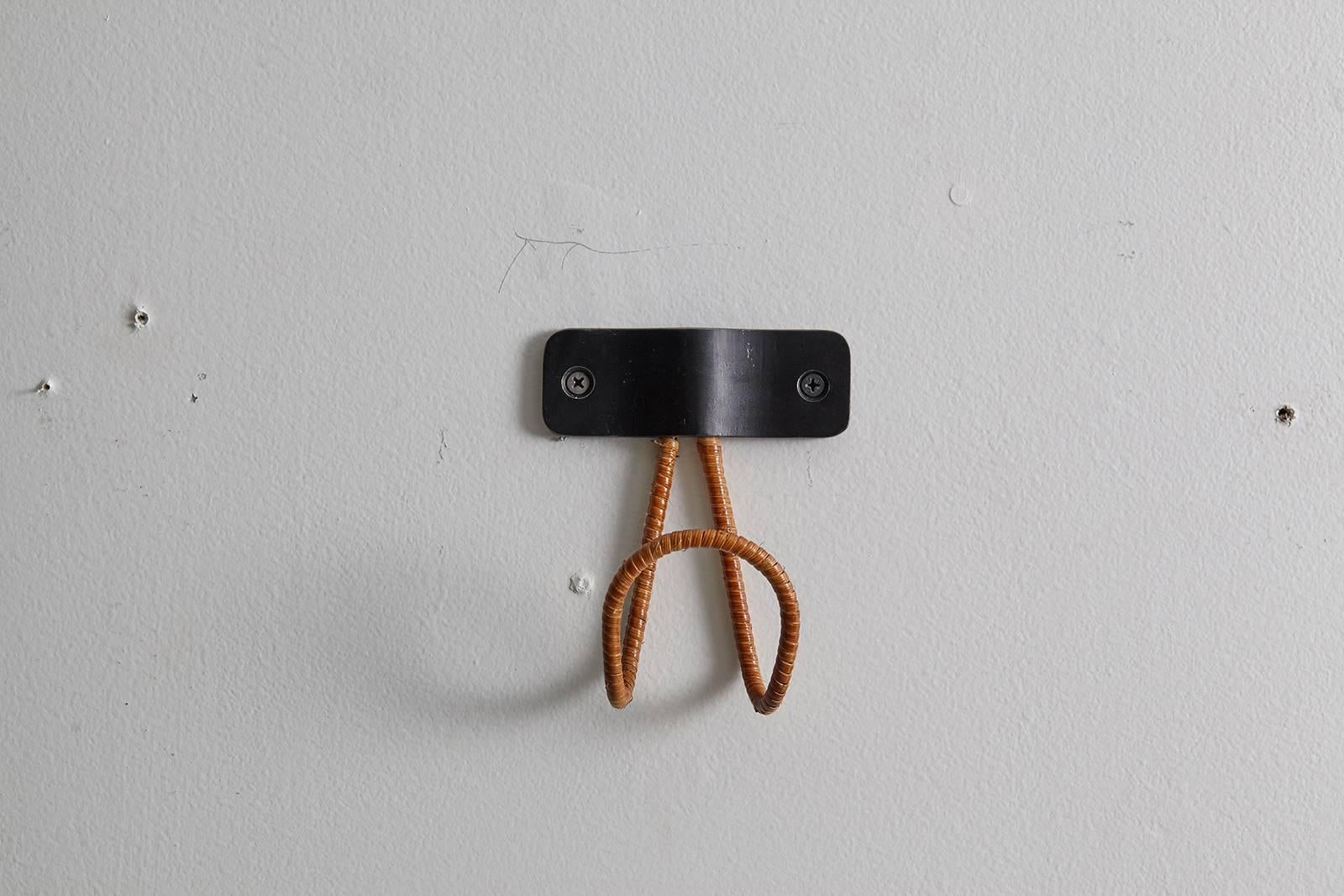 Mid-Century Modern Wicker and Iron Coat Hook by Orange For Sale