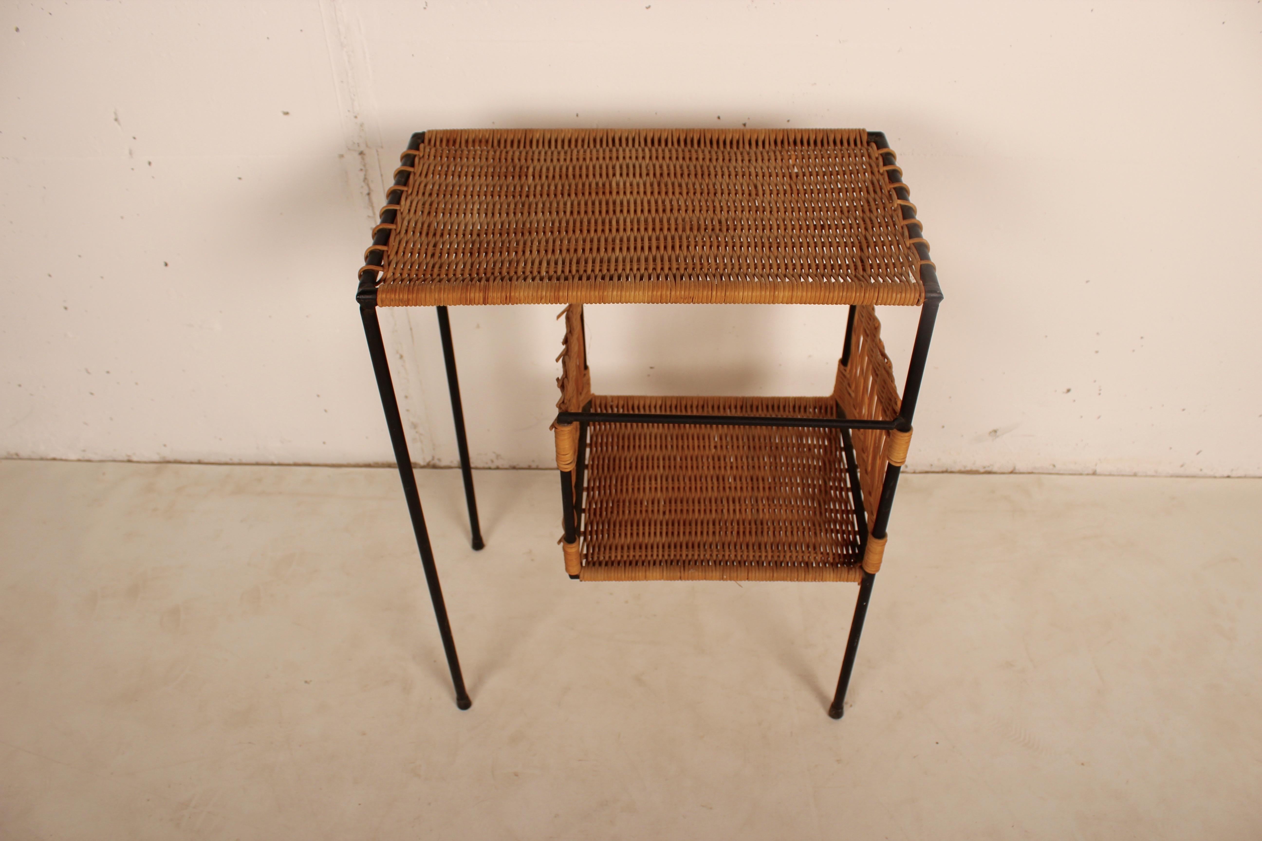 Wicker and black metal bedside, Raoul Guys, France, 1950.